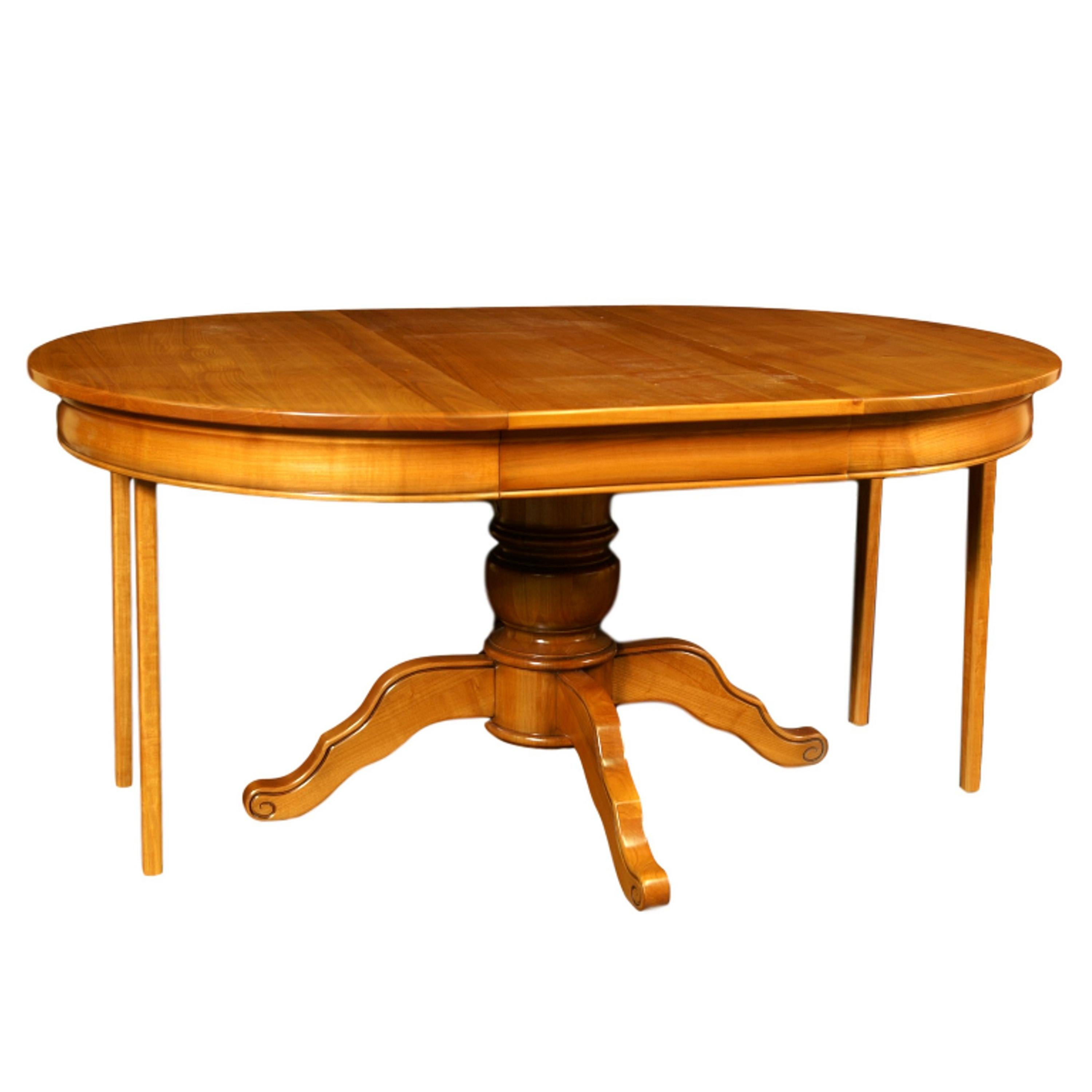 This dining round table is made of French solid Cherry and is typical of the Louis-Philippe period, mid-19th century with its hand-turned central foot.

2 Service extensions of 50 cm / 19.7'' each are provided. The first extension is made with a