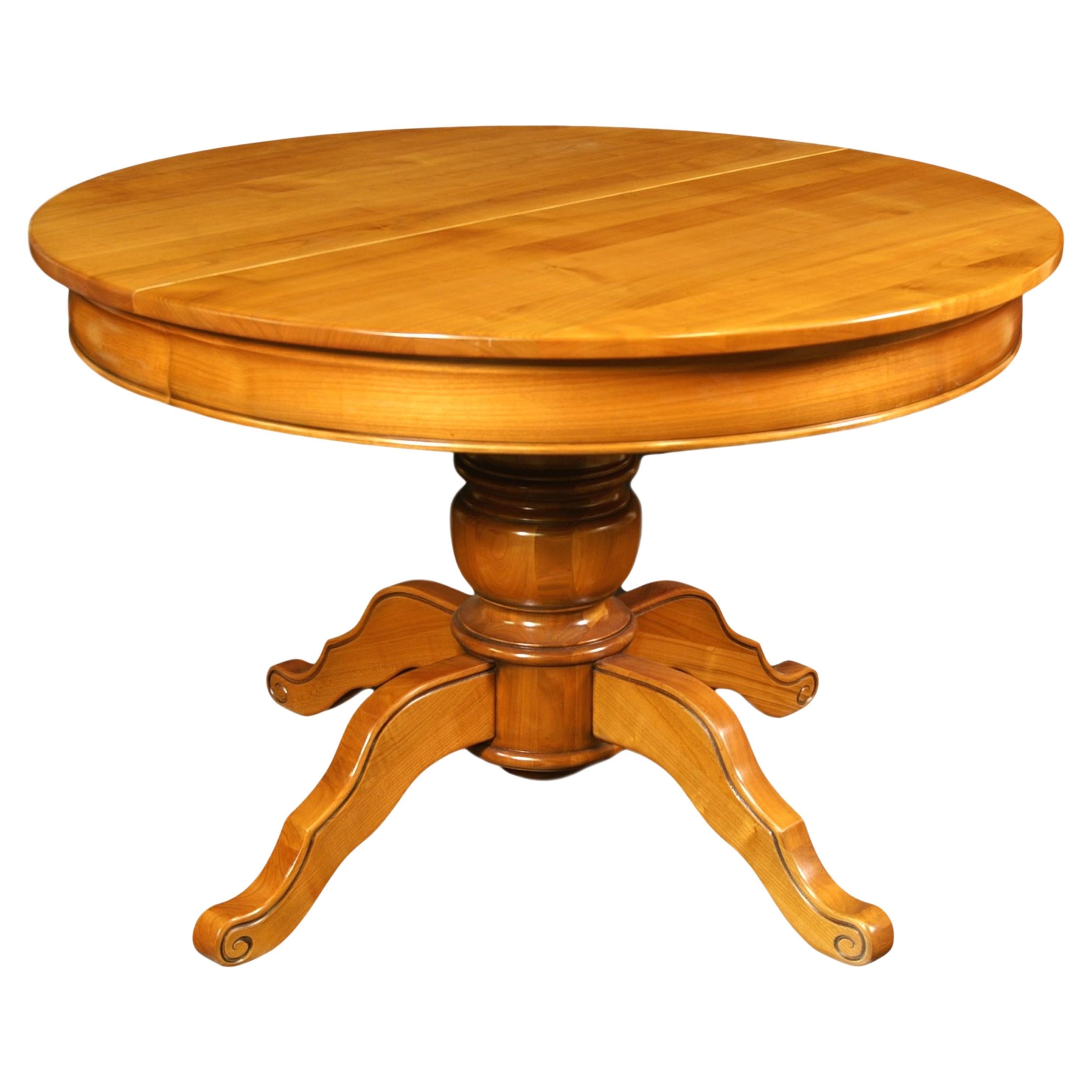 Round Table with a Central Foot and 2 Extensions in Solid Cherry