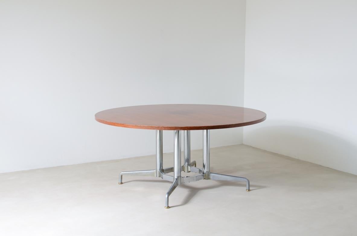 COD-648
Round table with a nice chromium plated base and wooden top.

1960's Italian manufacture .

160xh74