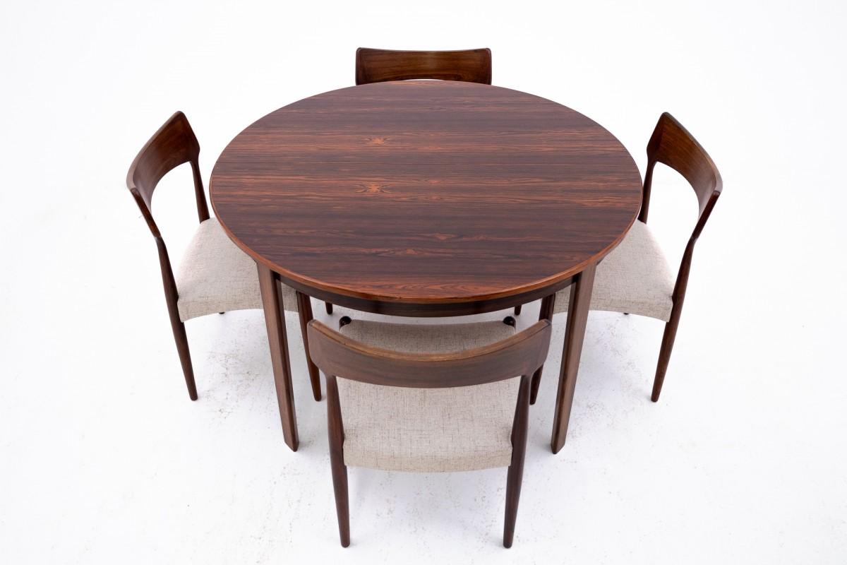 A set of four dining chairs designed by Bernhard Pedersen & Son, manufactured in Denmark in the 1960s. The table comes from Denmark and was manufactured in the 1960s. The table has one additional 50 cm long insert. The furniture is in very good