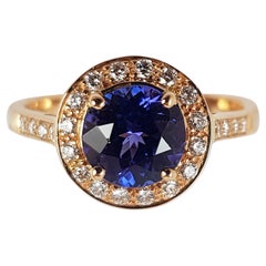 Round Tanzanite with Diamond Ring Set in 18 Karat Rose Gold Settings