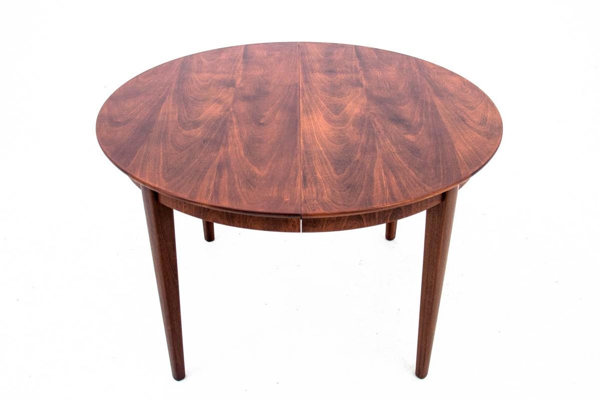 A teak table from the 1960s from Denmark. The furniture is in very good condition, after professional renovation.

Dimensions: height 74 cm, diameter 115 cm, lengths 115-265 cm.