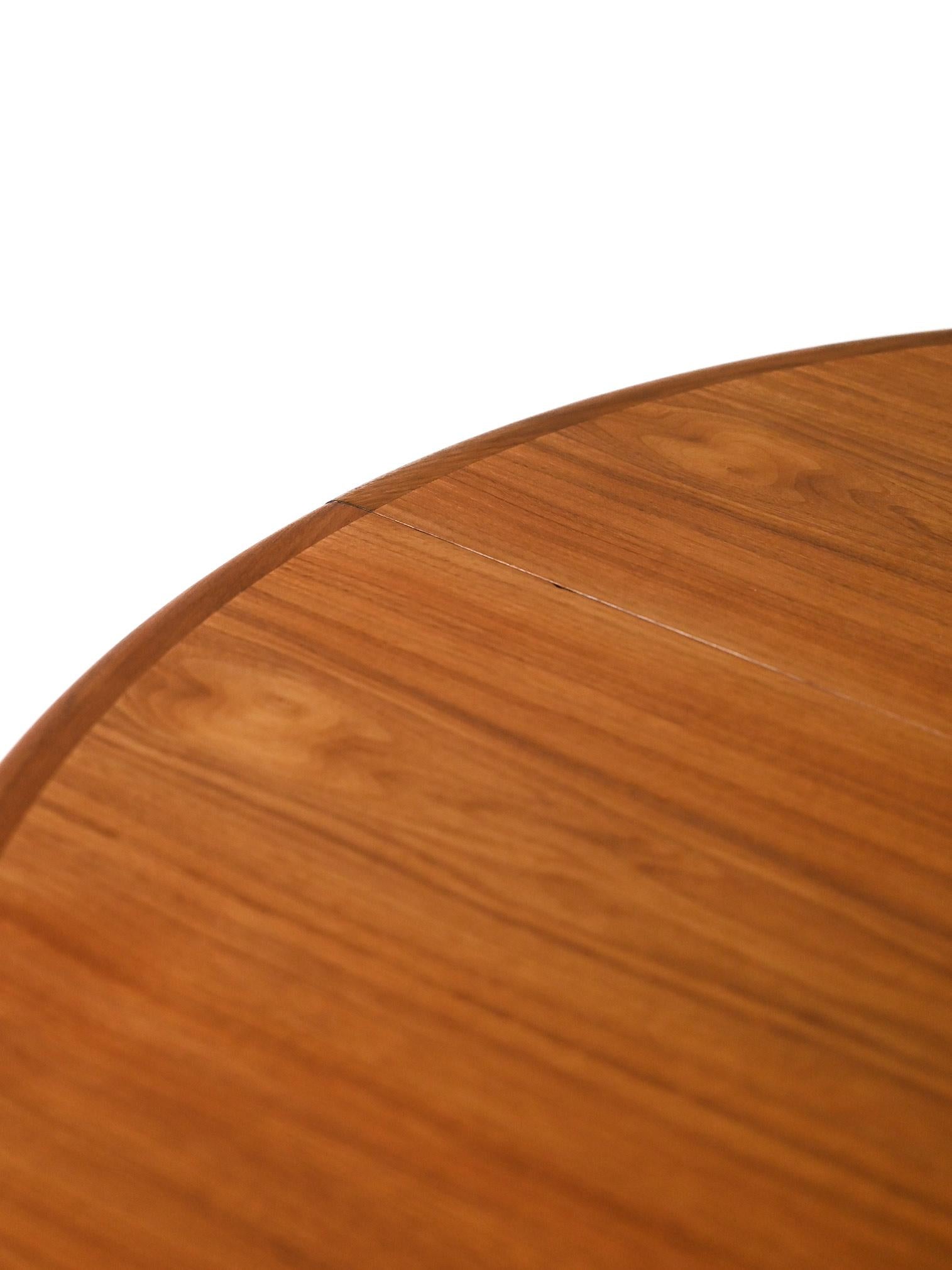 Round teak dining table 4