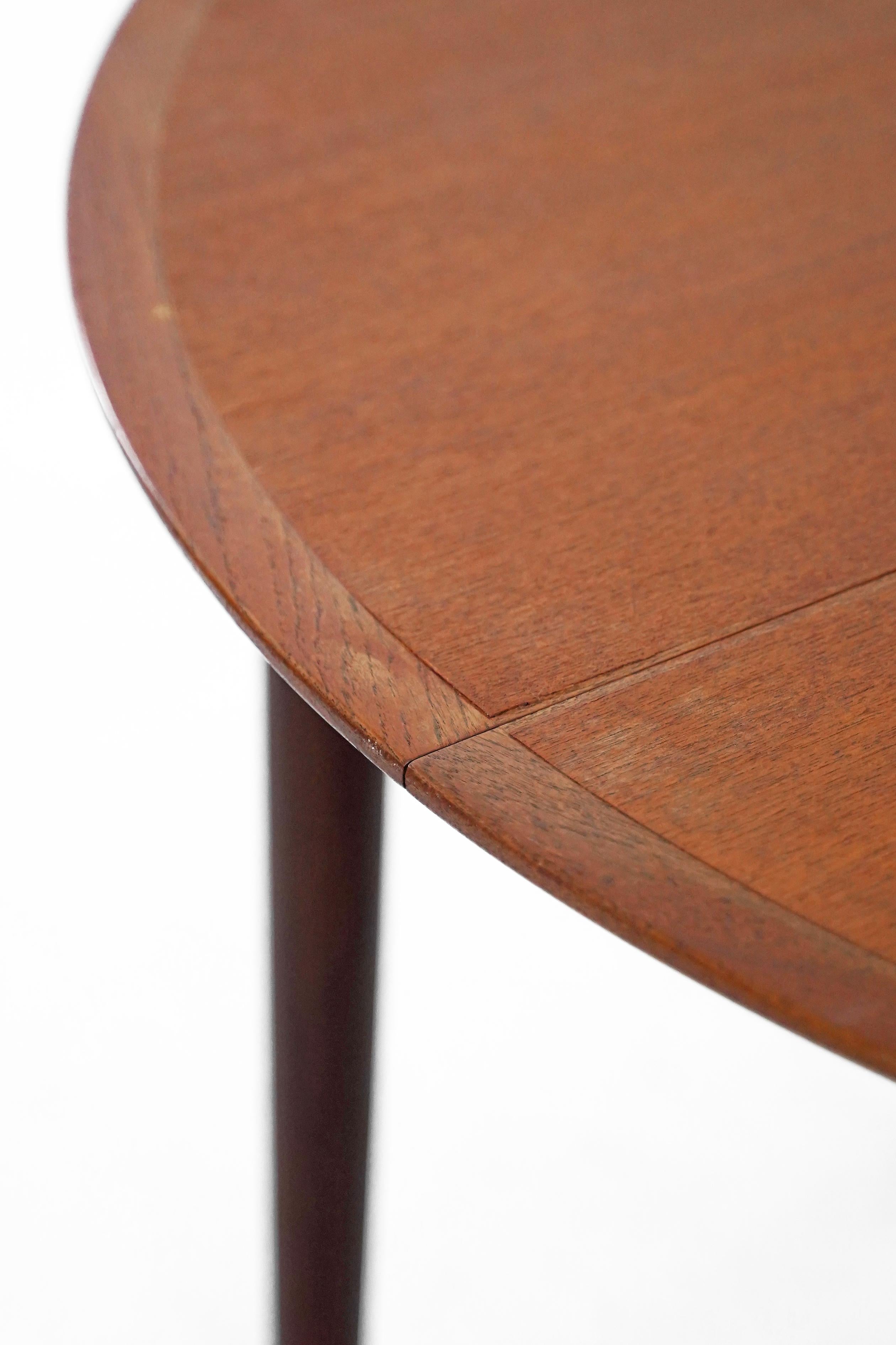 Round Teak Dining Table with Butterfly Leaf for N & R Mobler 1