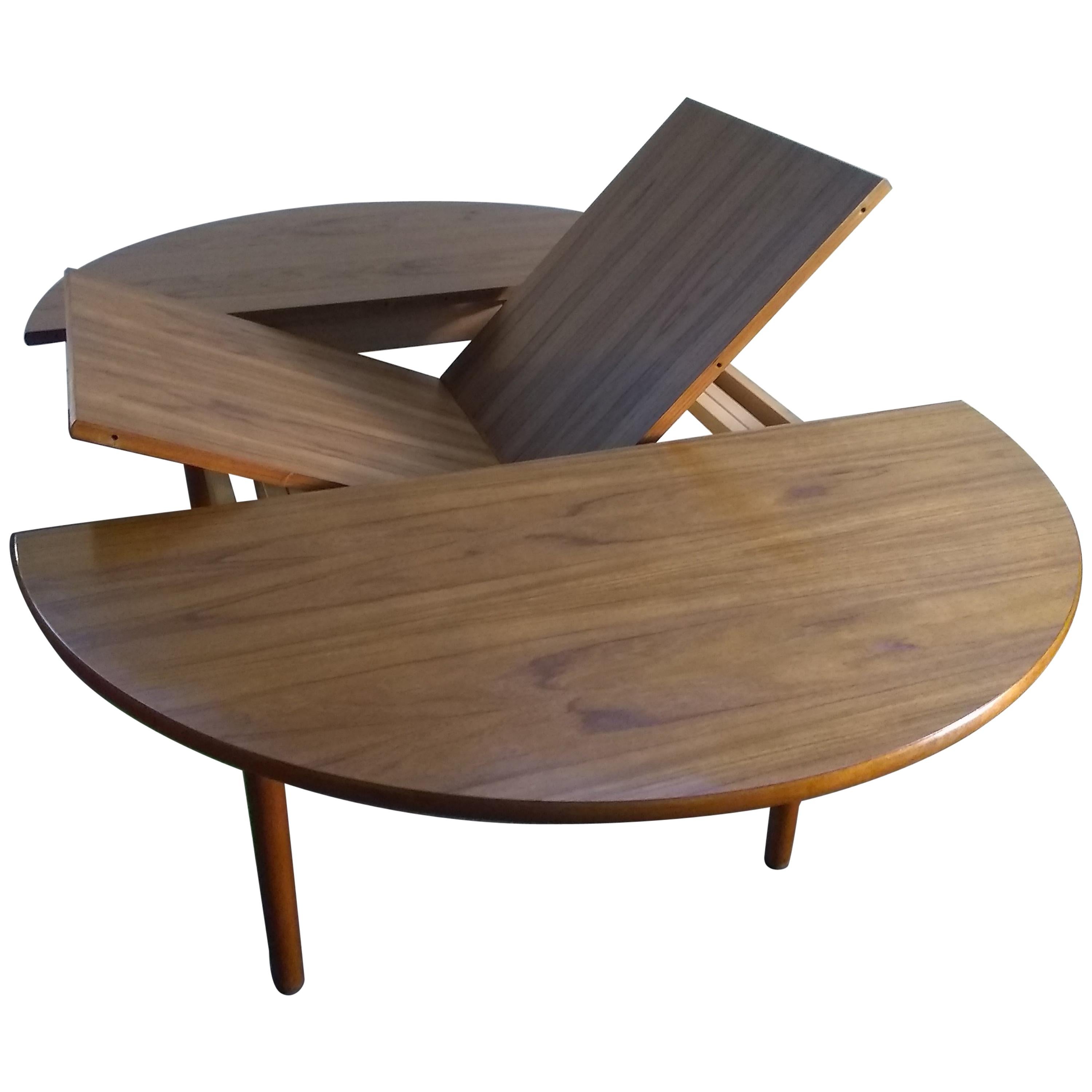 Round Teak Dining Table with Self Storing Butterfly Leaf by Hornslet Mobler