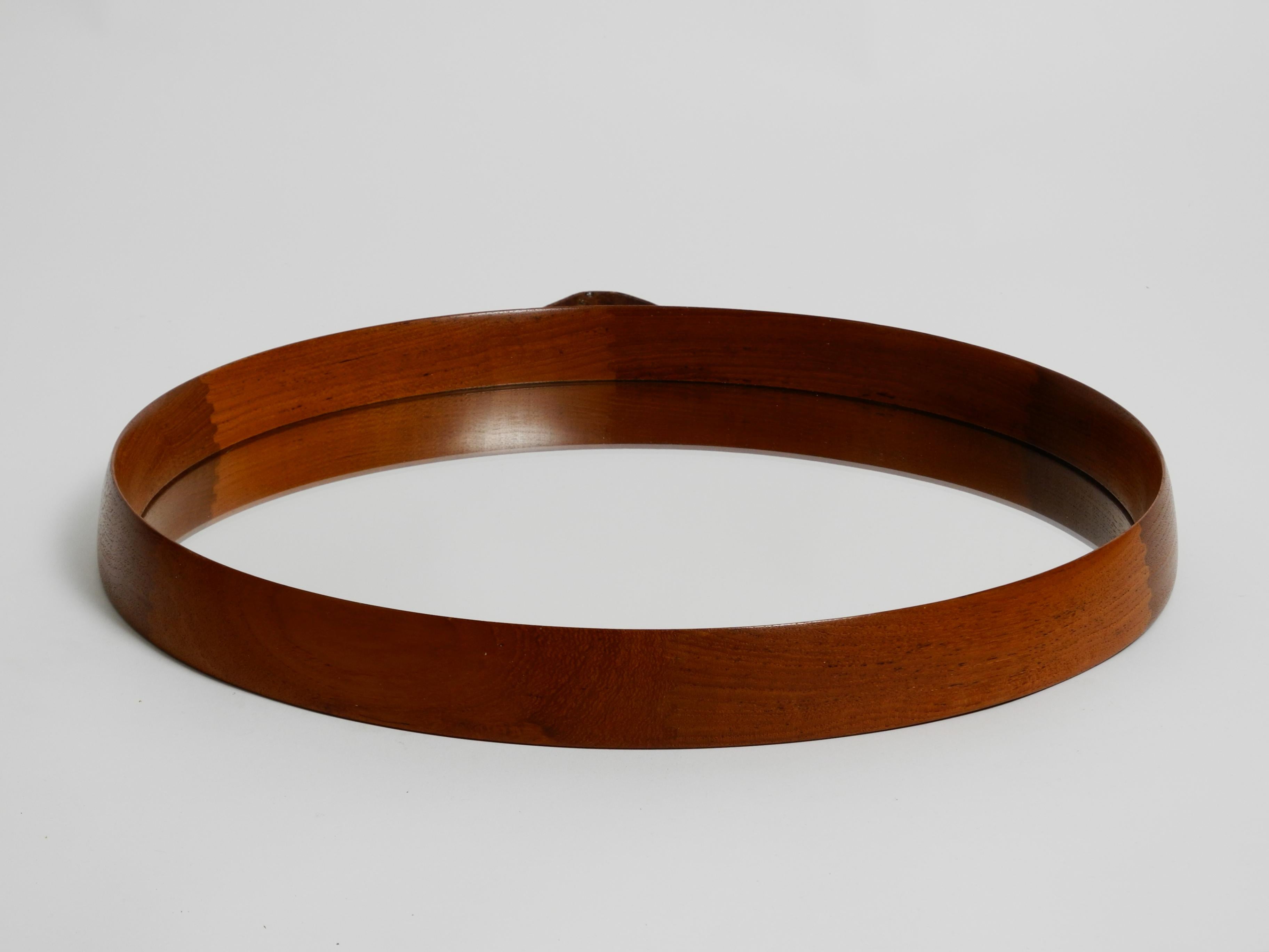 specchio rotondo con cinghia pelle
