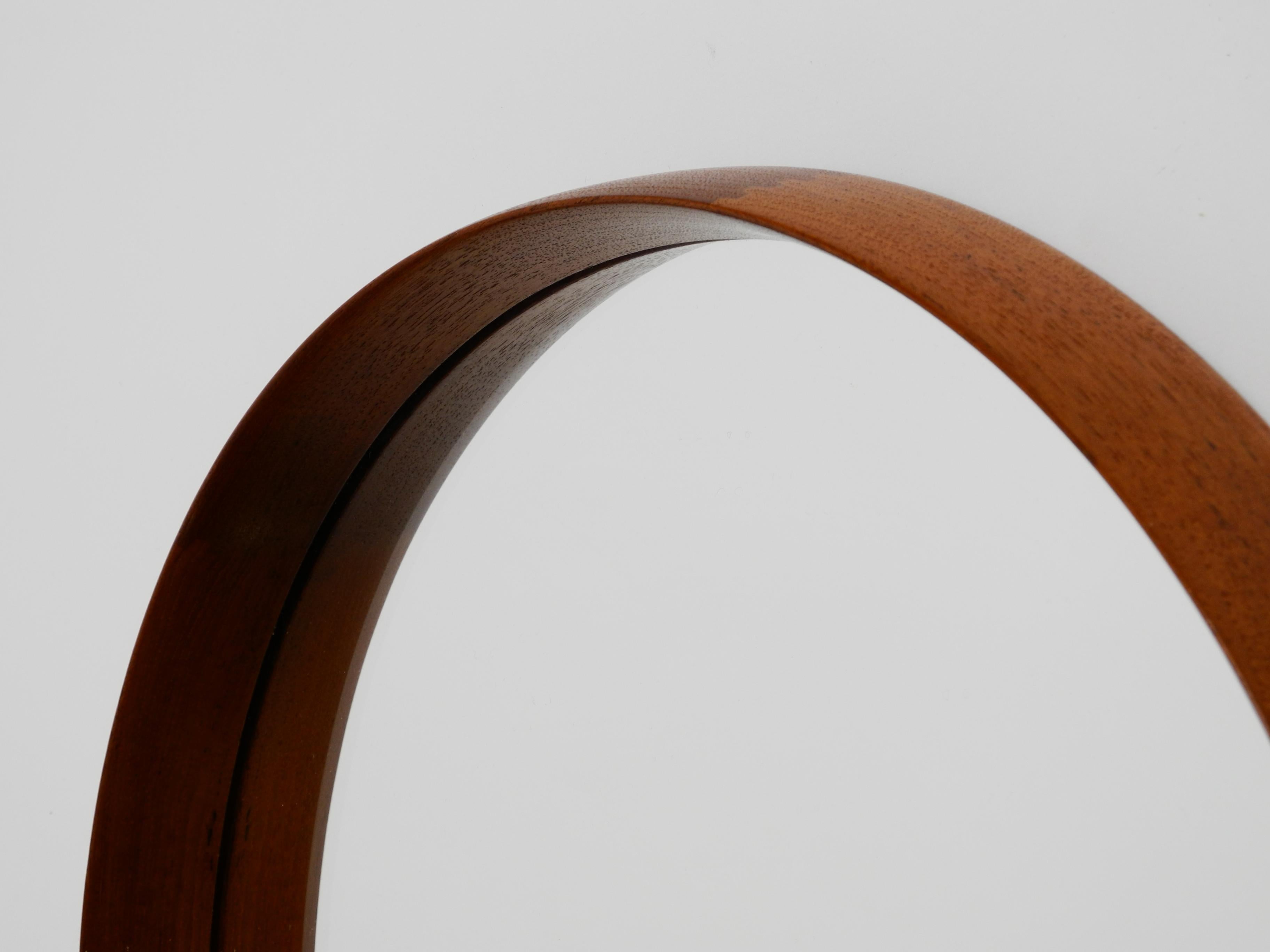 Mid-Century Modern Round Teak Mirror with Leather Straps by Uno and Östen Kristiansson for Luxus For Sale