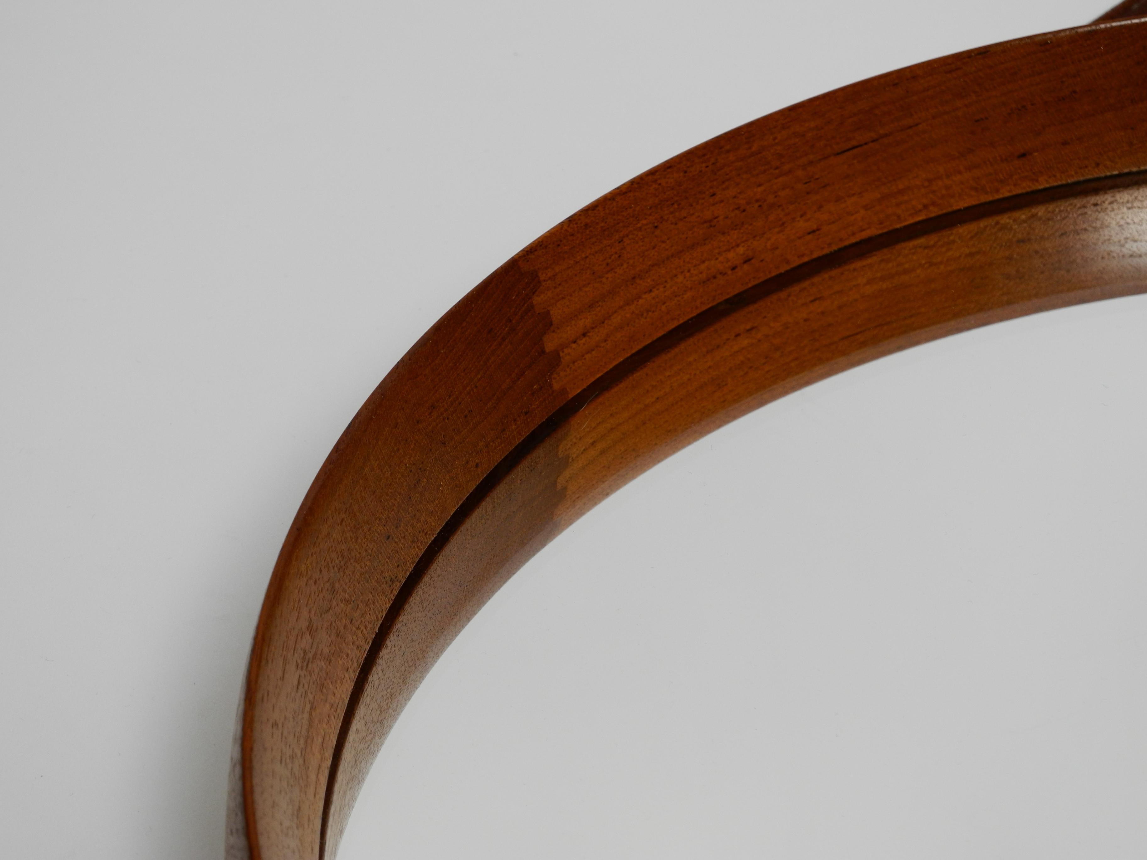 Swedish Round Teak Mirror with Leather Straps by Uno and Östen Kristiansson for Luxus For Sale