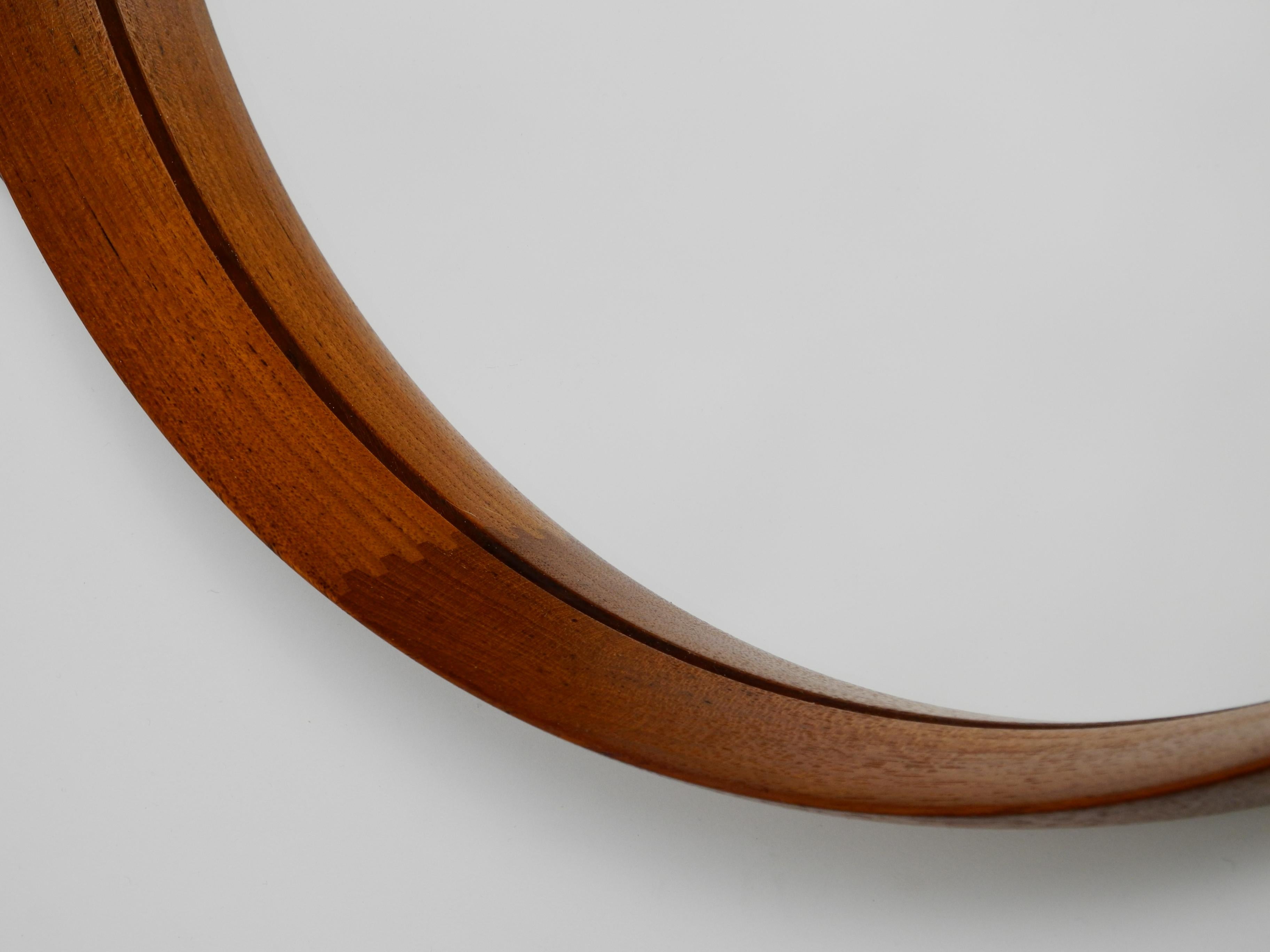 Round Teak Mirror with Leather Straps by Uno and Östen Kristiansson for Luxus In Good Condition For Sale In München, BY