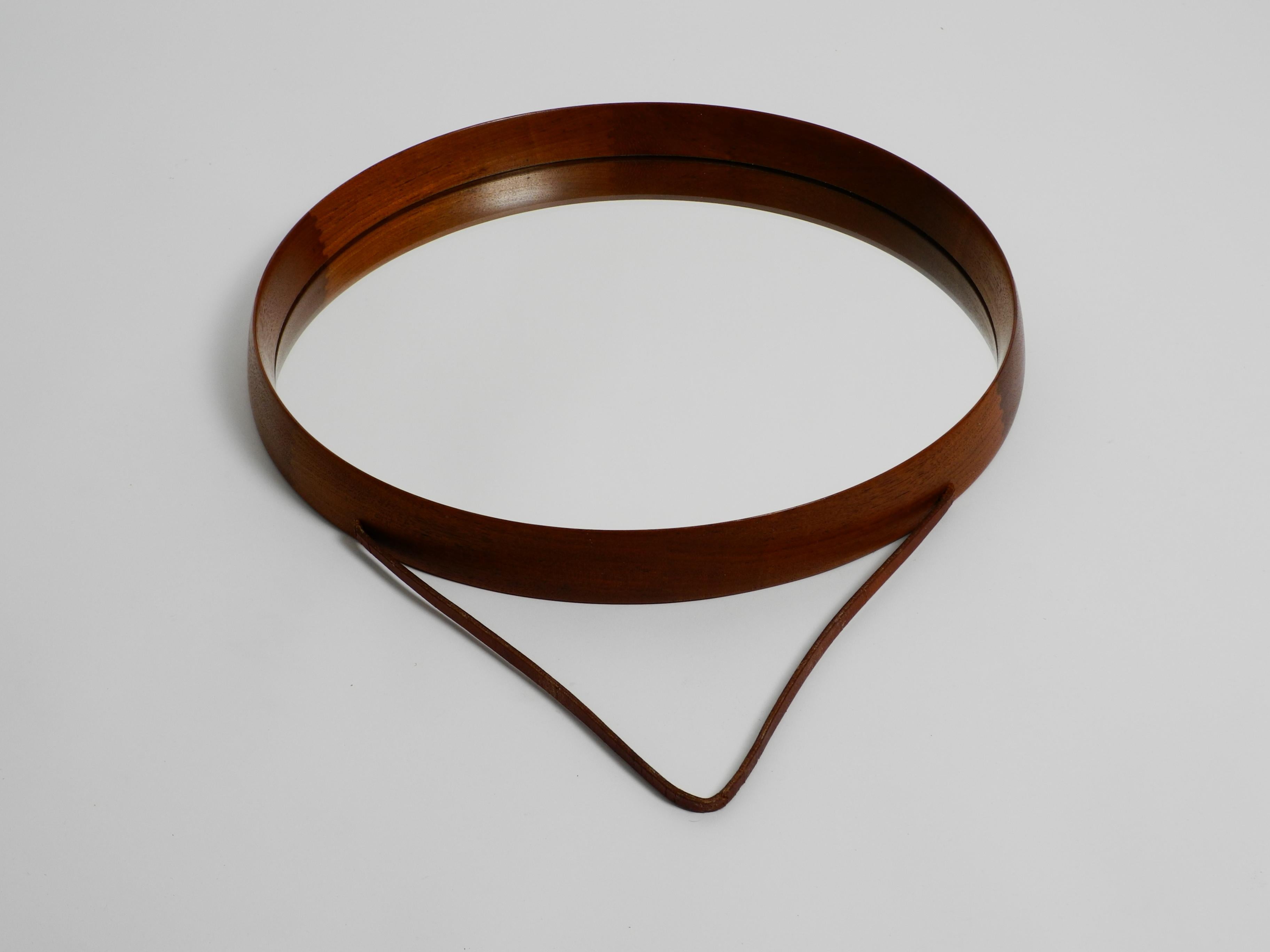 Round Teak Mirror with Leather Straps by Uno and Östen Kristiansson for Luxus For Sale 1