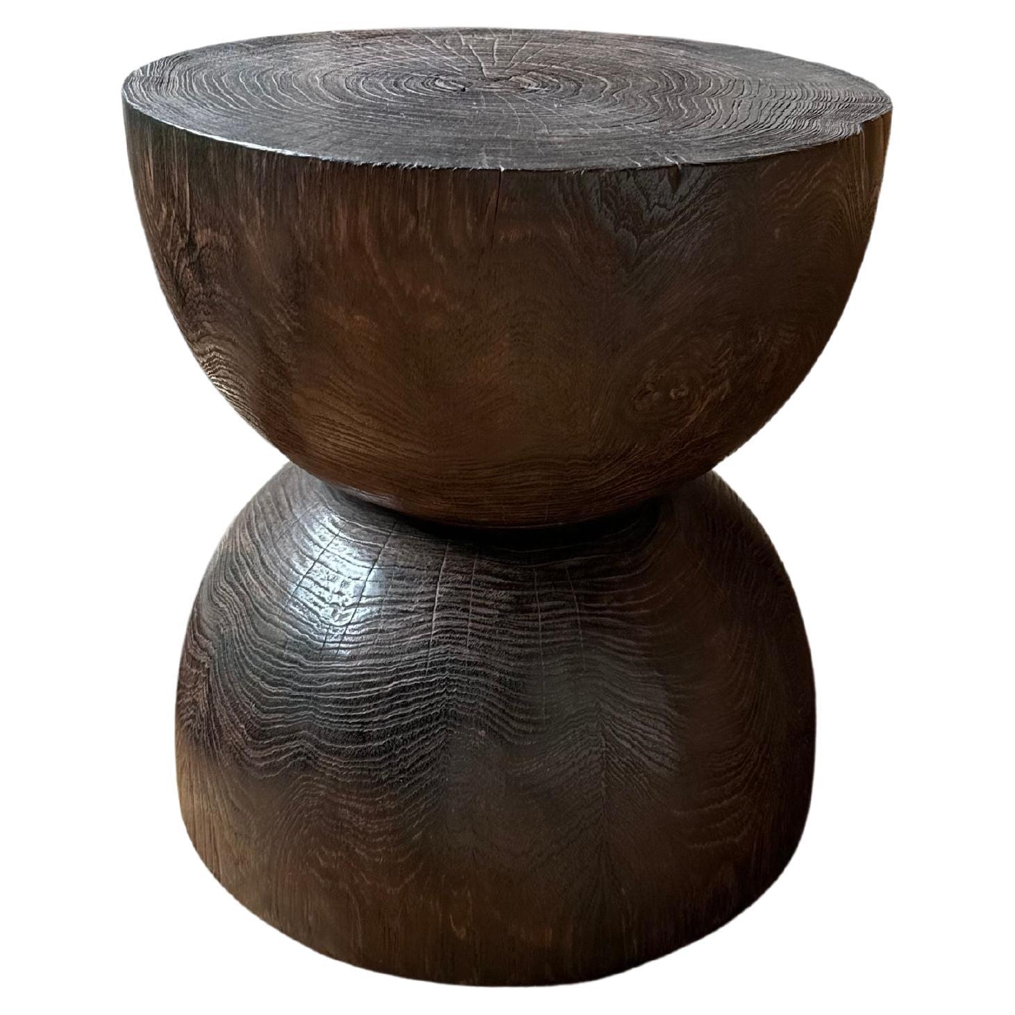 Round Teak Wood Side Table, Burnt Finish, Hour Glass Design, Modern Organic For Sale