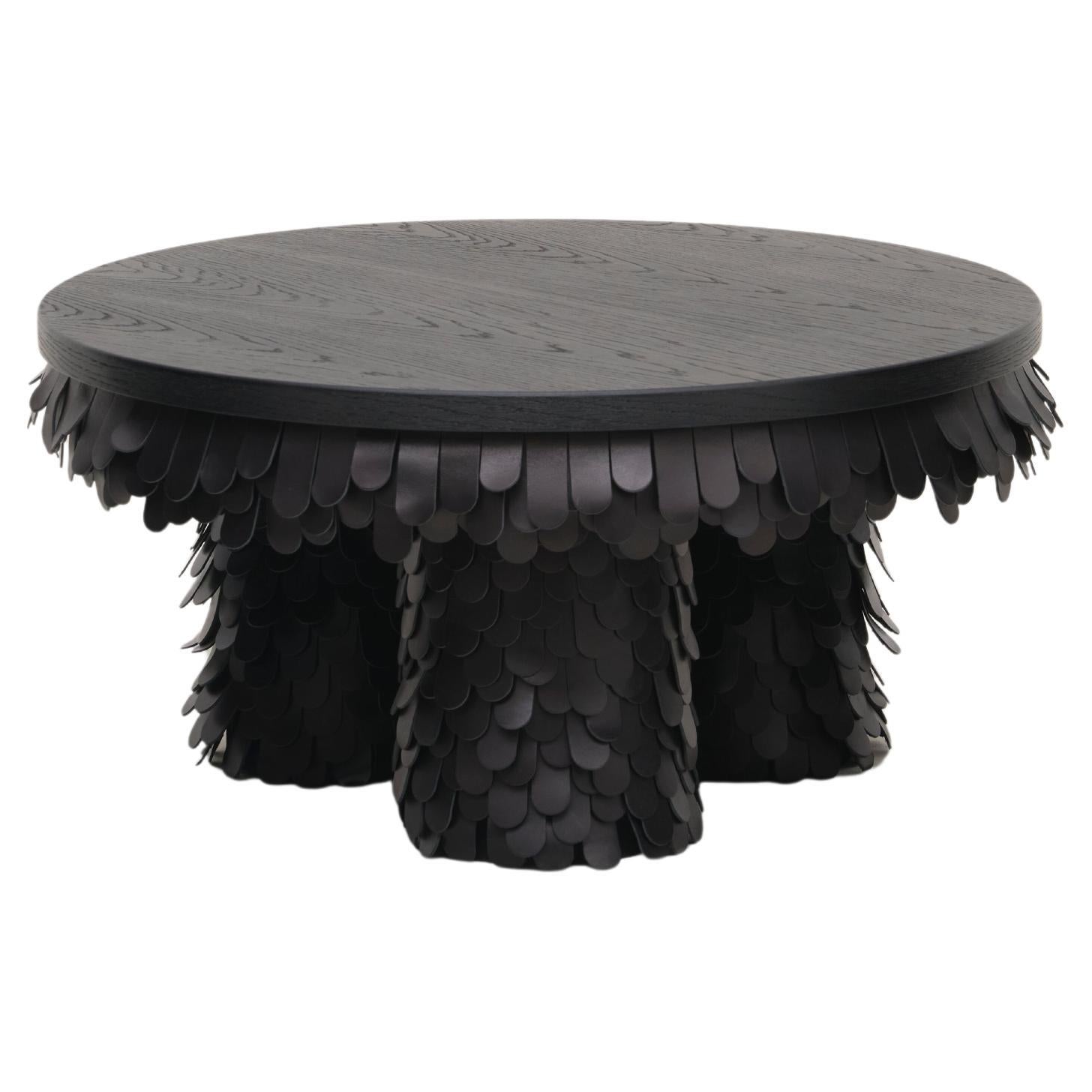 table basse ronde en bois et cuir noir organique texturé