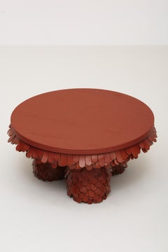 round textured organic brown leather and wood coffee table