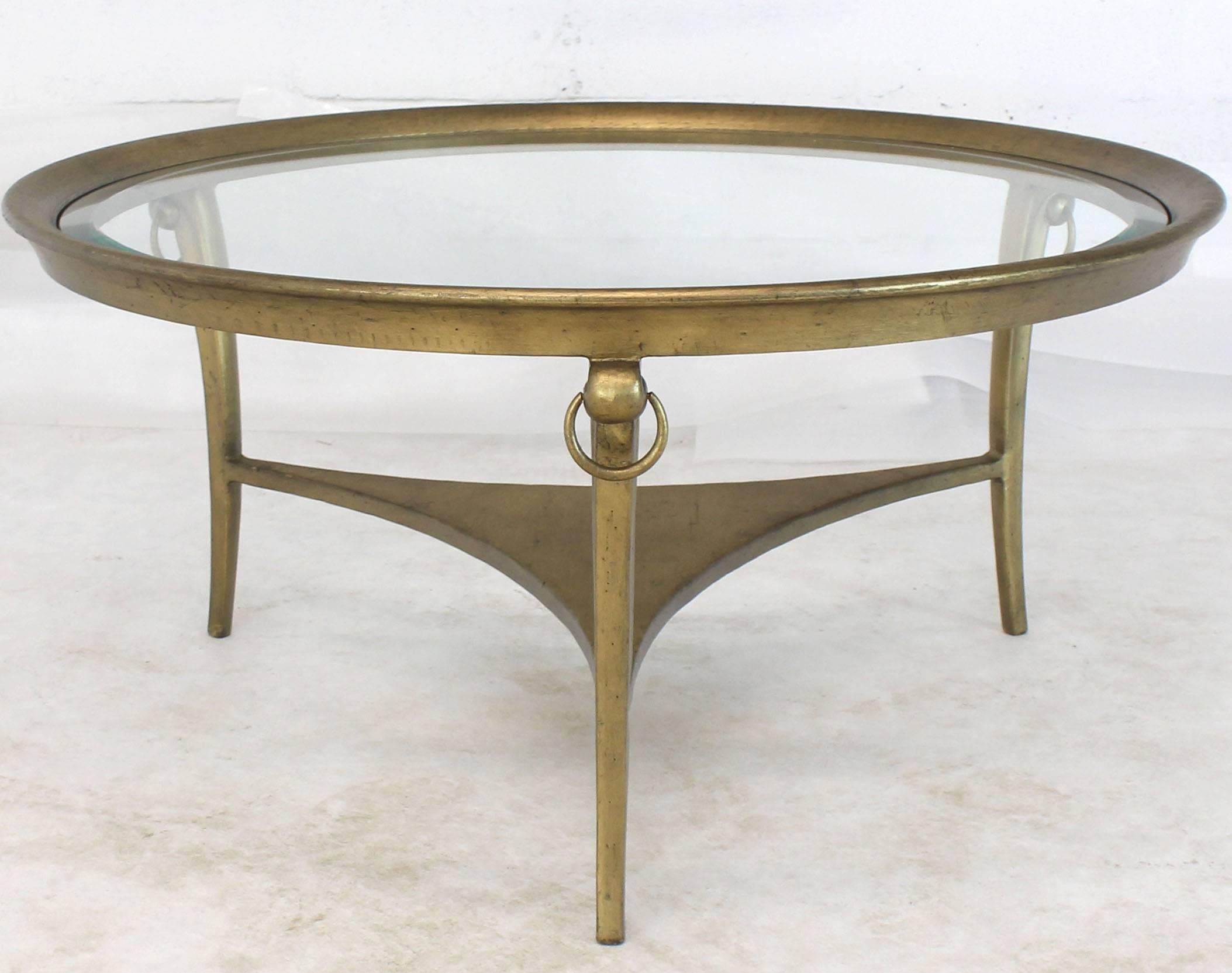 Solid painted metal iron base round glass top coffee table.