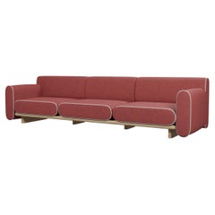 Round three-seater sofa Tilda with Cherry plain fabric handcrafted by Murmurio