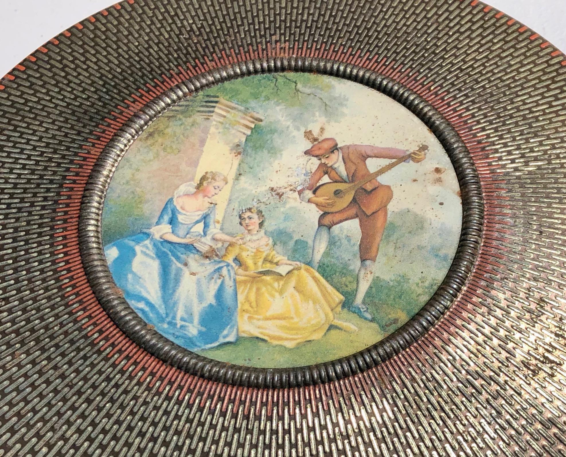 20th Century Round Tin Box with a Musician and Two Ladies Depicted on Top, Weaved Tin Design For Sale