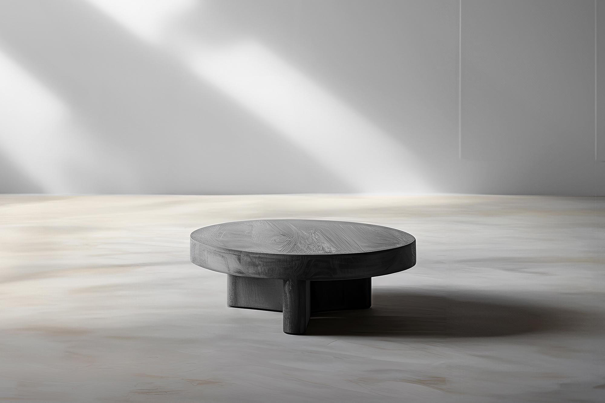 Round Top Fundamenta Coffee 59 Abstract Oak, Stylish Design by NONO

Sculptural coffee table made of solid wood with a natural water-based or black tinted finish. Due to the nature of the production process, each piece may vary in grain, texture,