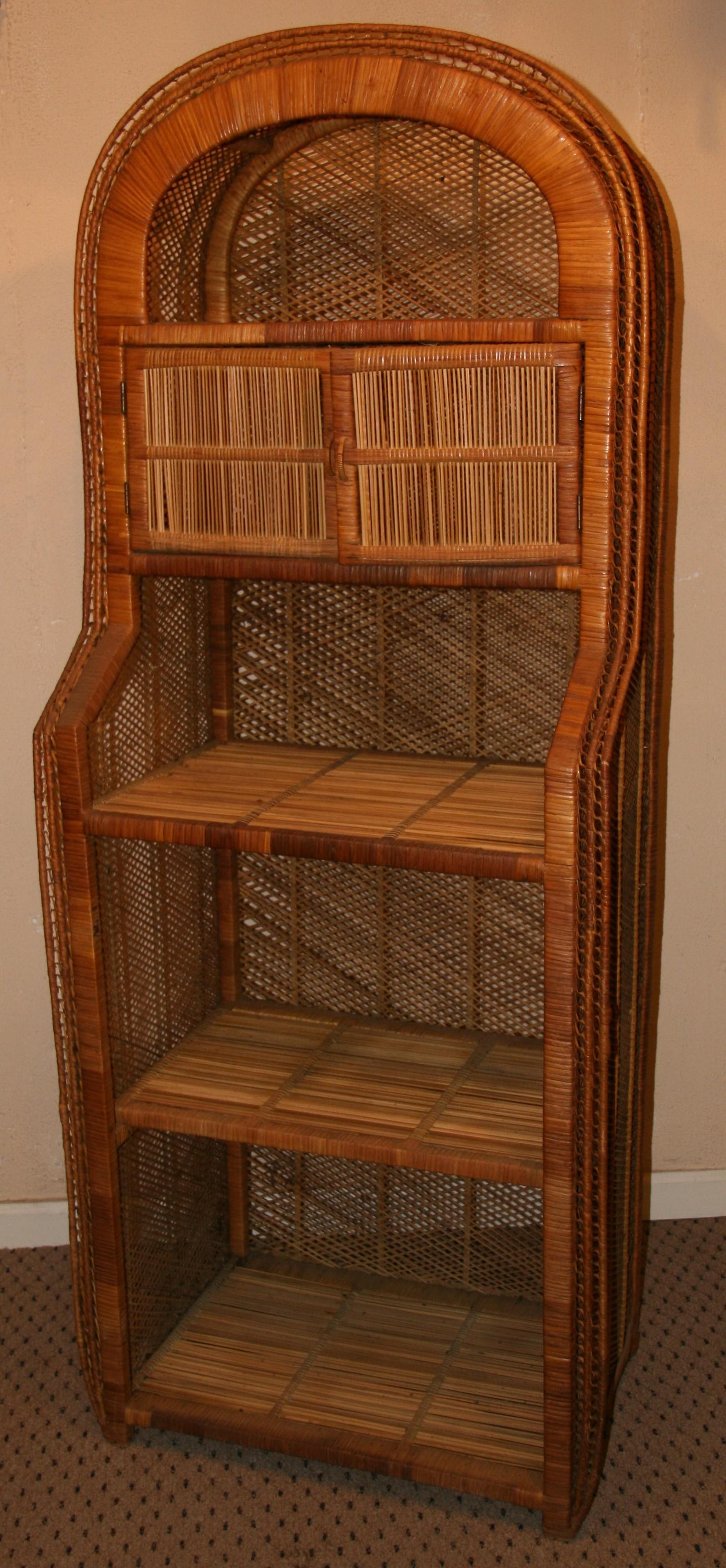 3-988 Hand crafted reed and wicker etagere with 5 shelves and folding upper doors
Top 12