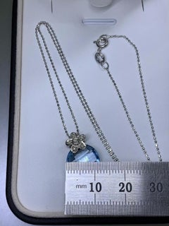Round Topas blue diamond pendant necklace 18ct white gold chain.