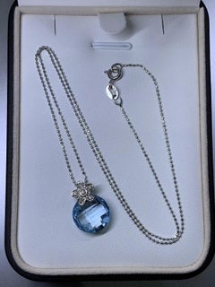Round Topas blue diamond pendant necklace 18ct white gold chain.