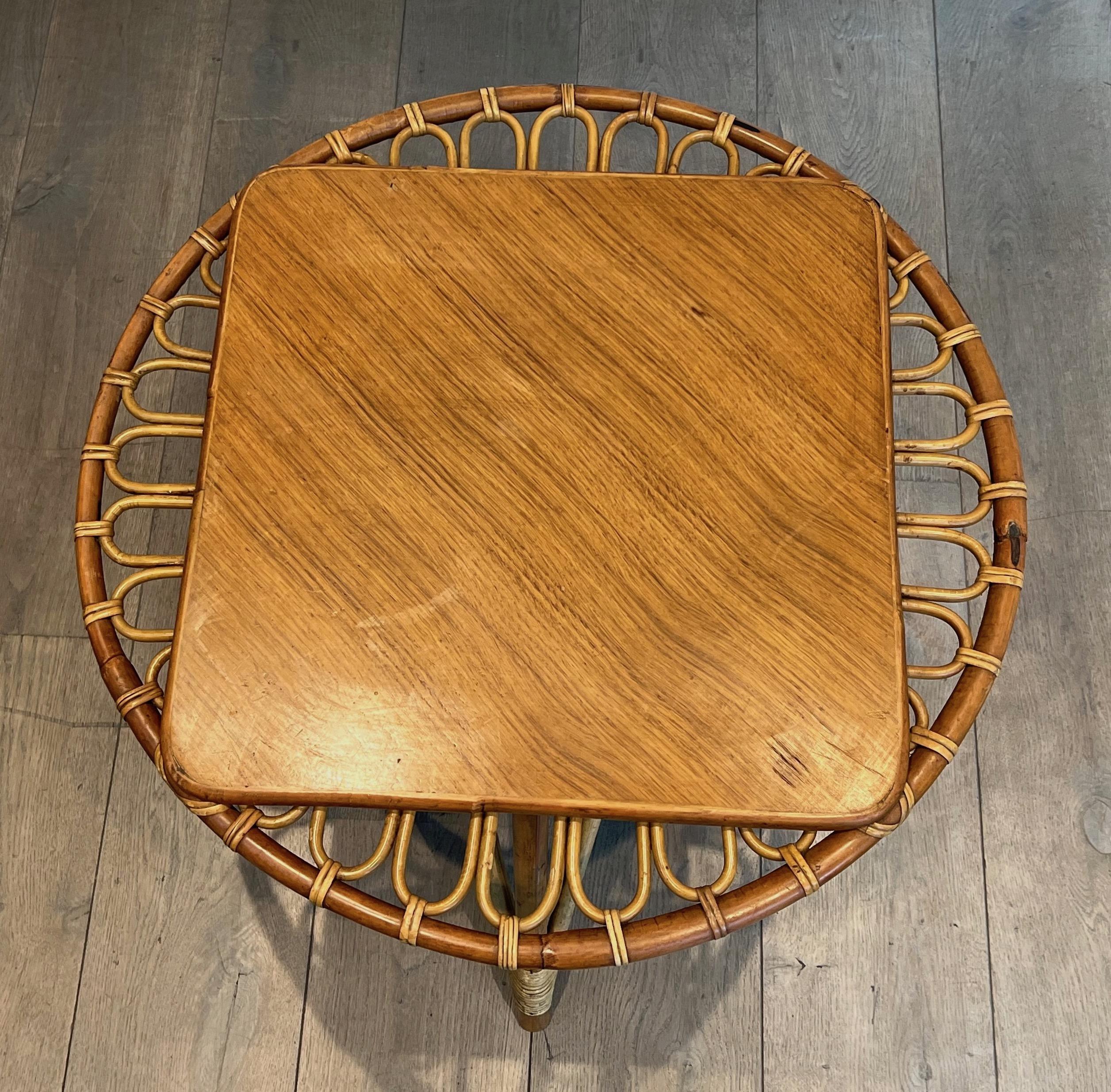 Mid-20th Century Round trampoline, rattan coffee table. French work. Circa 1950 For Sale