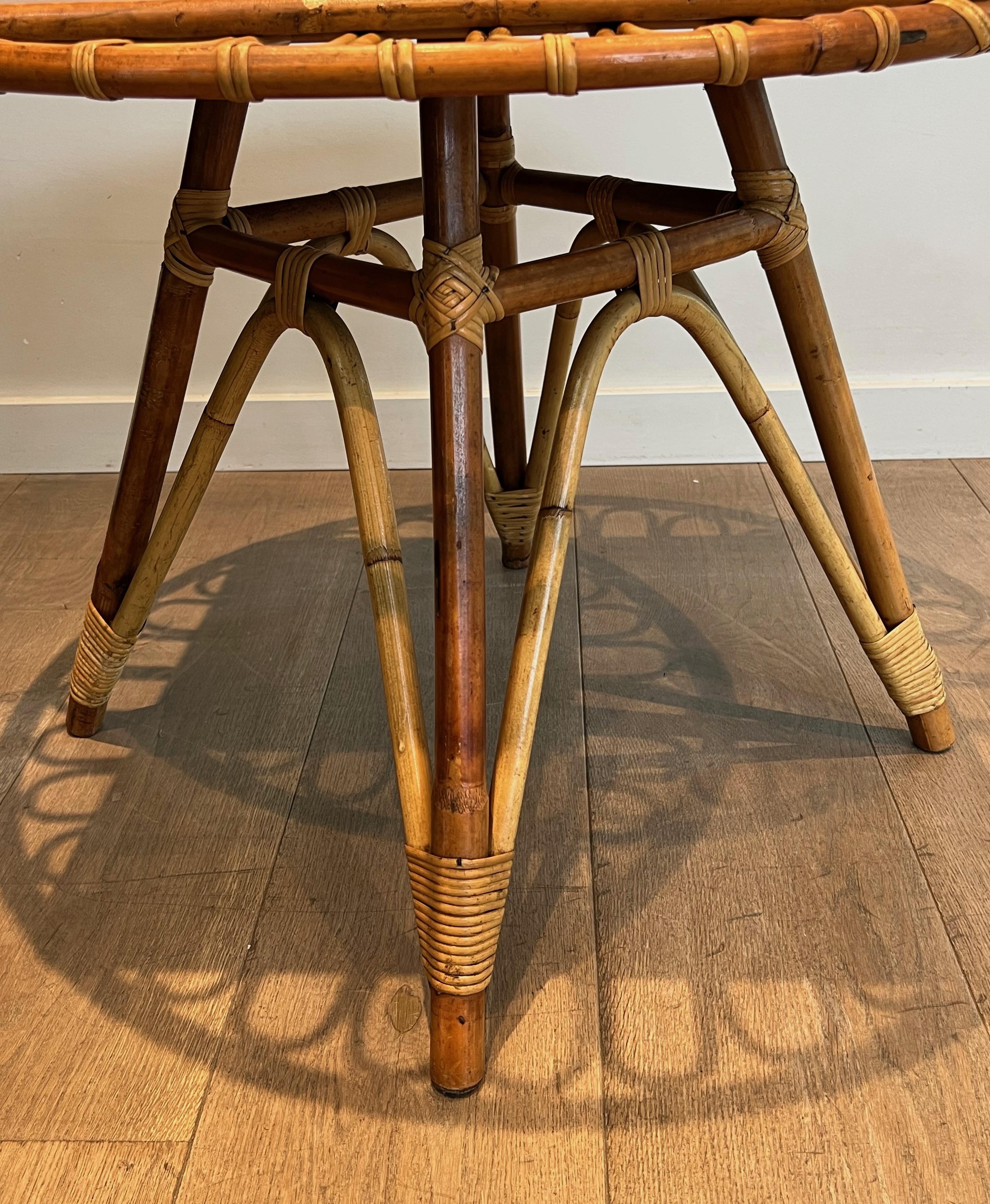 Round trampoline, rattan coffee table. French work. Circa 1950 For Sale 3