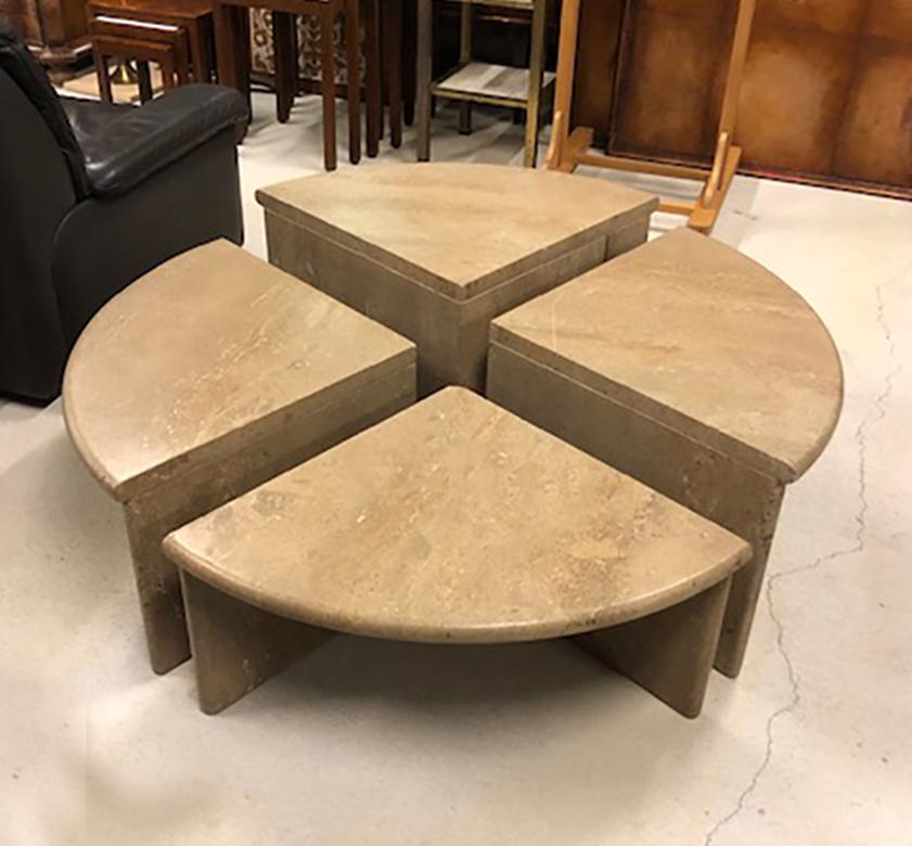Round travertine cocktail table of very unique olive to greige color, composed of 4 pie-shaped pieces, each of a different height, Italy, 1970s.

Diameter varies depending on configuration: 44