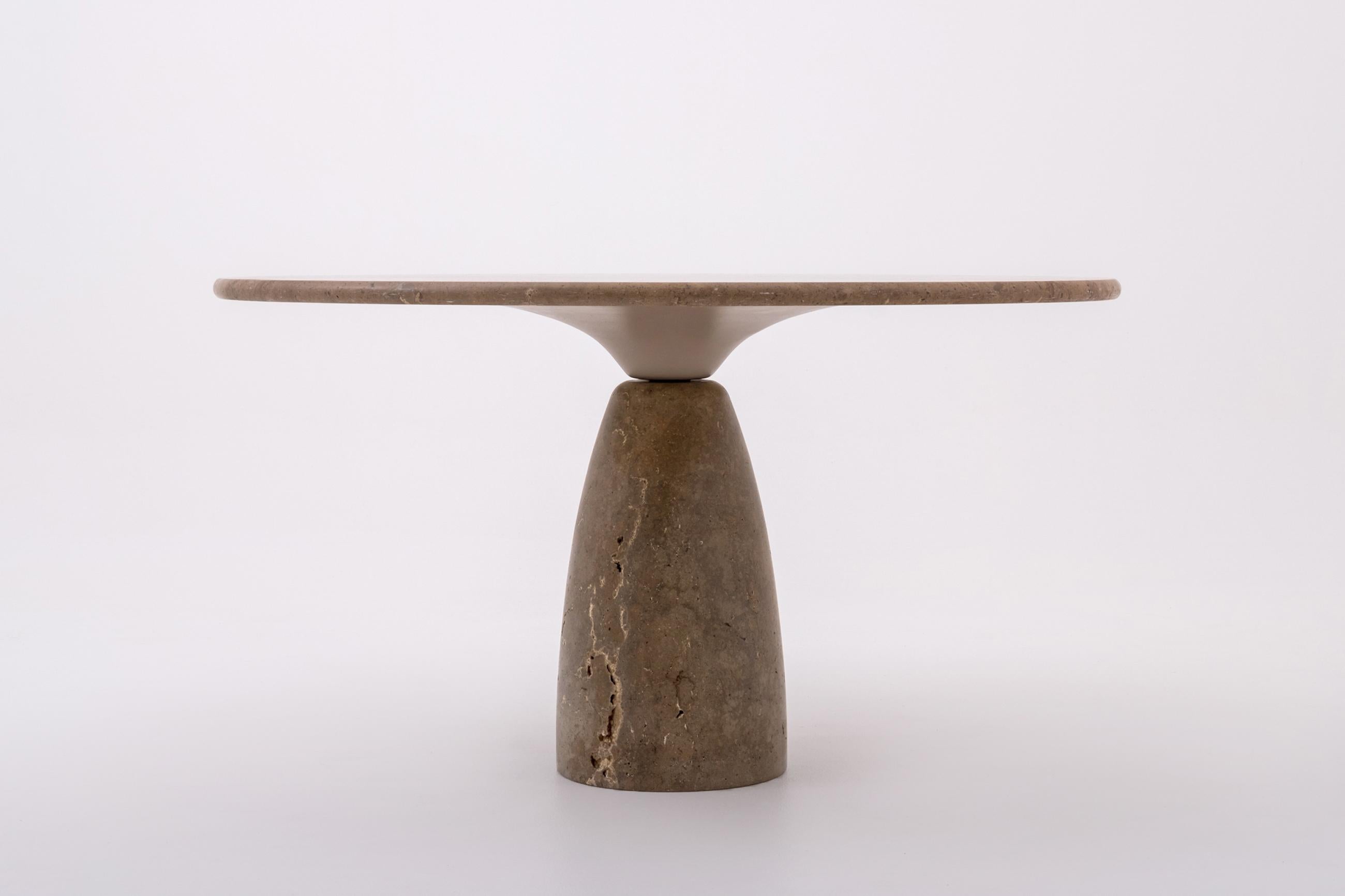 Stunning round Travertine 'Finale 1790' dining table by Peter Draenert, Germany 1972.
Very sculptural appearance. The 3 cm thick Walnut Travertine (very light creamy brown) top lays on a solid Travertine column shaped base and aluminium trumpet