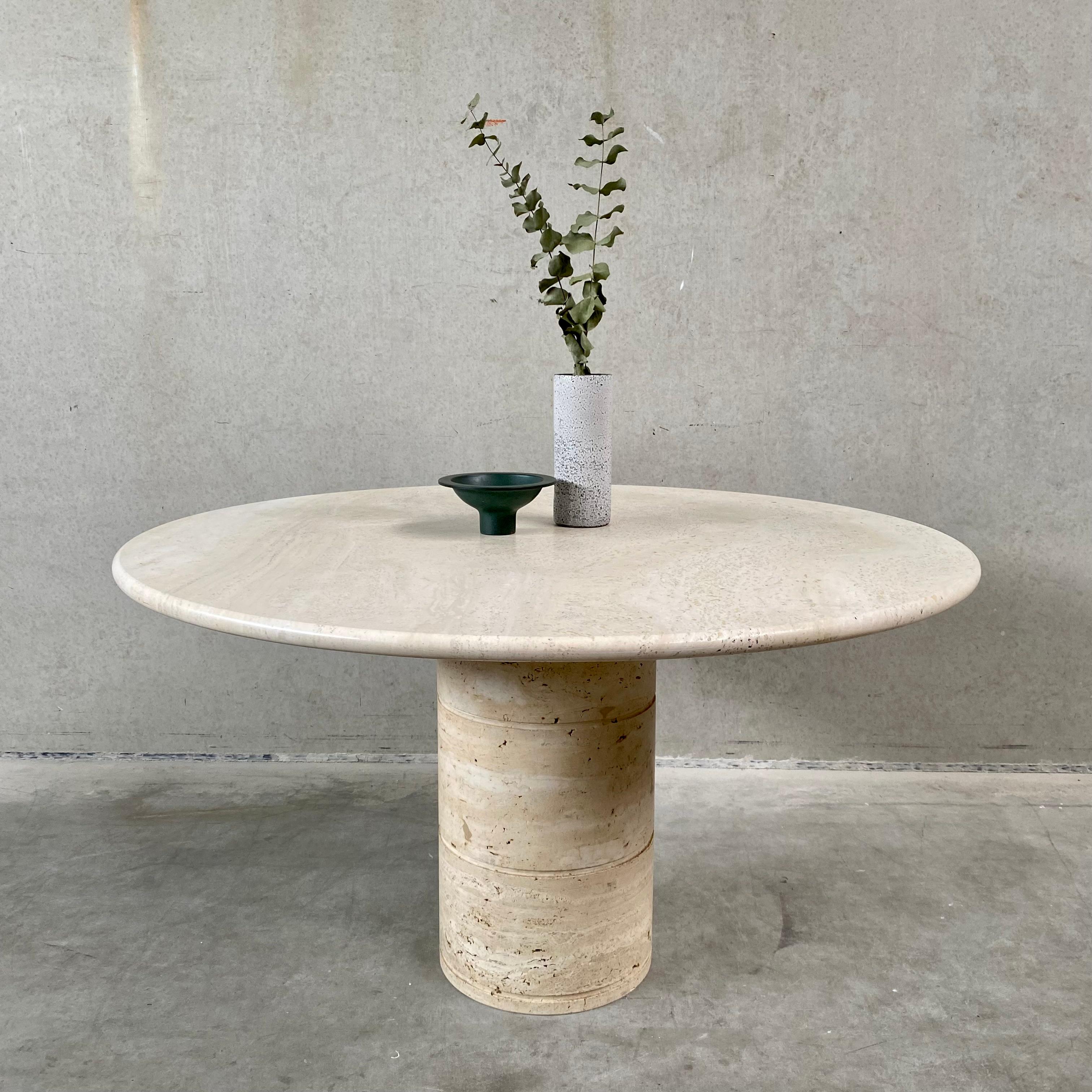 TRAVERTINE ROUND DINING TABLE FOR UP & UP, ITALY 1970S

The earthy tones and drawings of this table are truly enchanting. From the thickness of the top you can clearly read the quality of the table. Italian designers know better than anyone how to