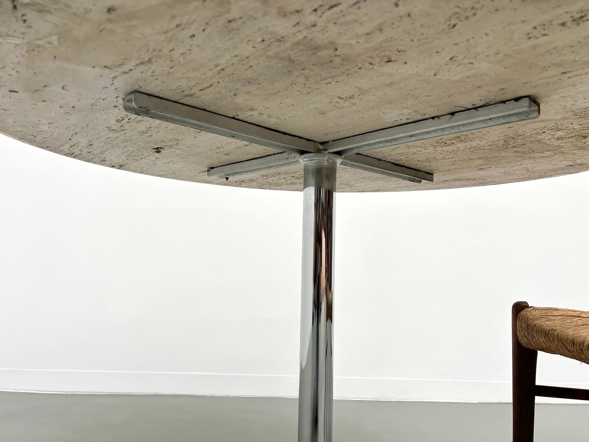 Round travertine dining table, circa 1970. 6