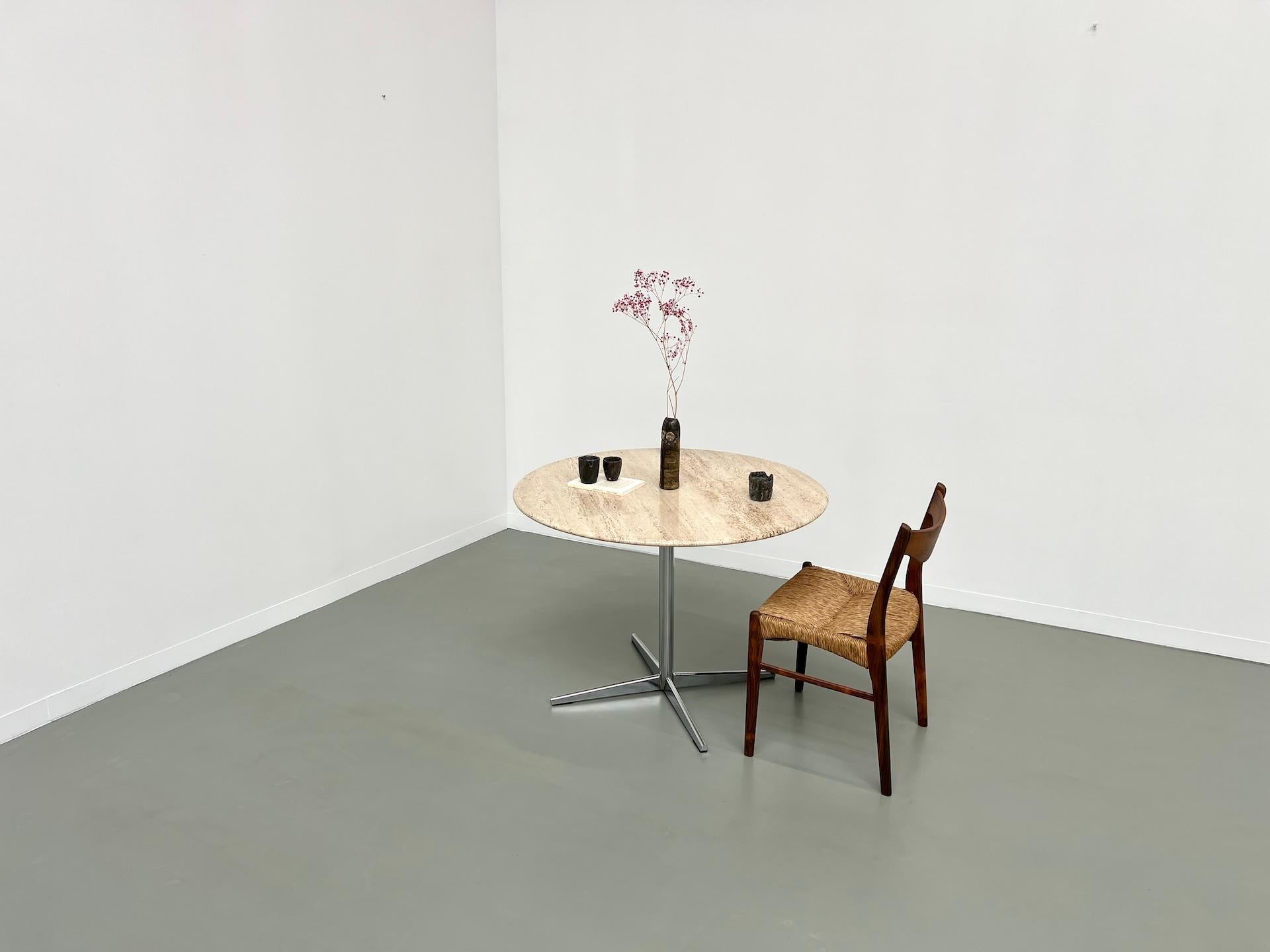 Round travertine dining table, circa 1970. 8