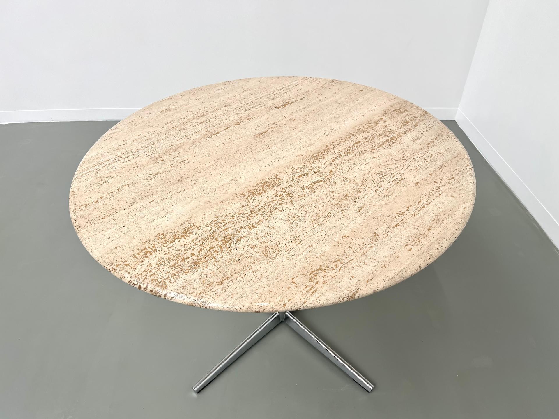 Round travertine dining table, circa 1970. 13