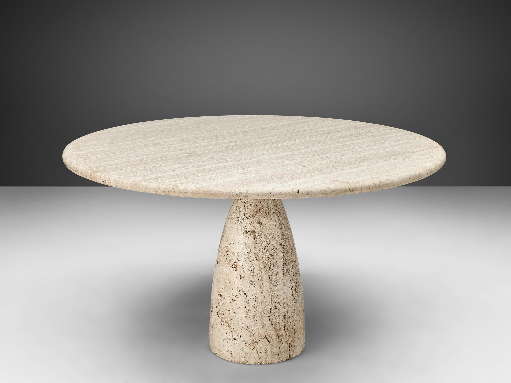 Dining table, travertine, Europe, 1970s.

This solid dining table features a colon, cone shaped foot and a thick circular travertine tabletop. The aesthetics are archetypical for postmodern design, bearing references to architectural forms and