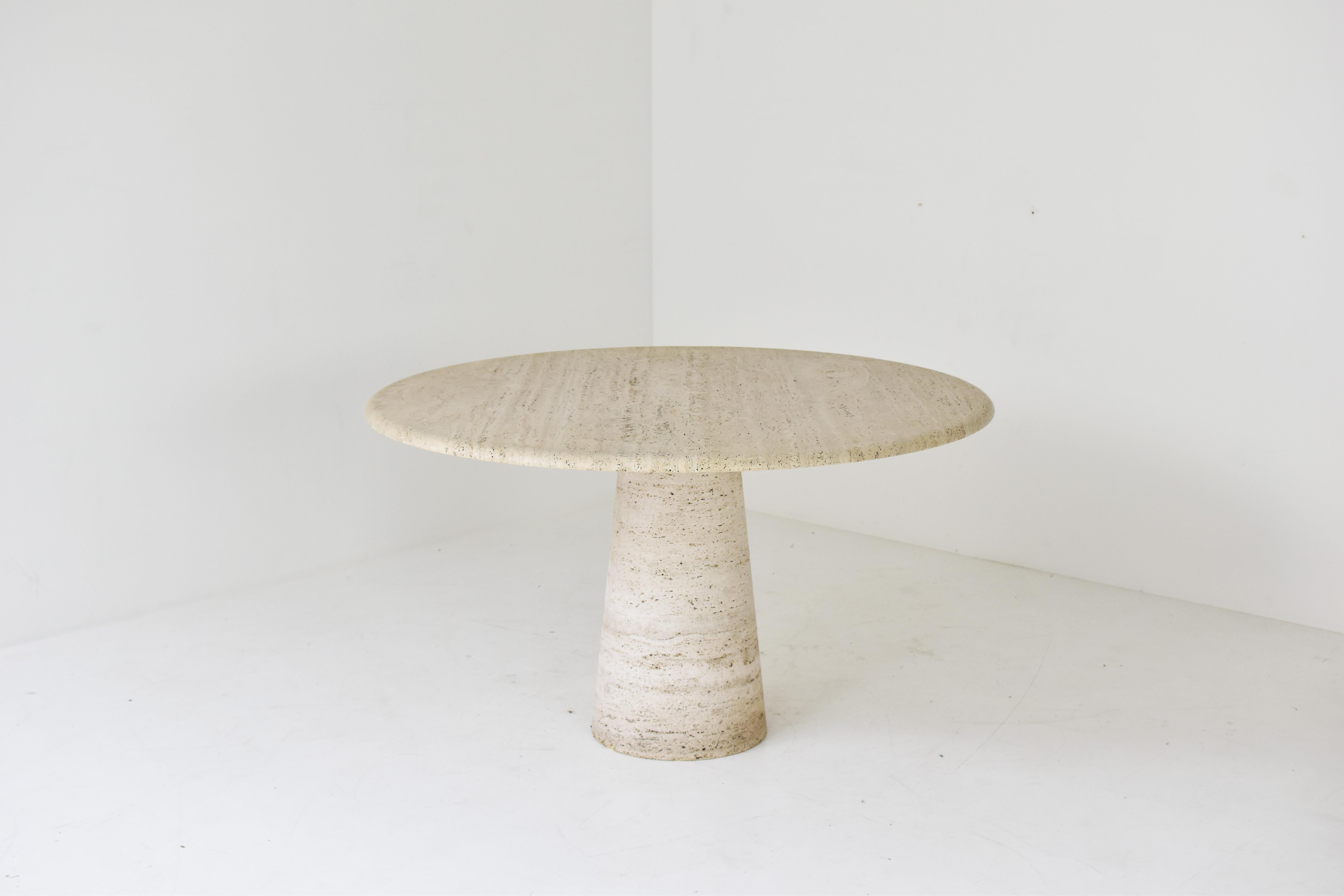 European Round travertine dining table in the manner of Angelo Mangiarotti, Italy 1970’s