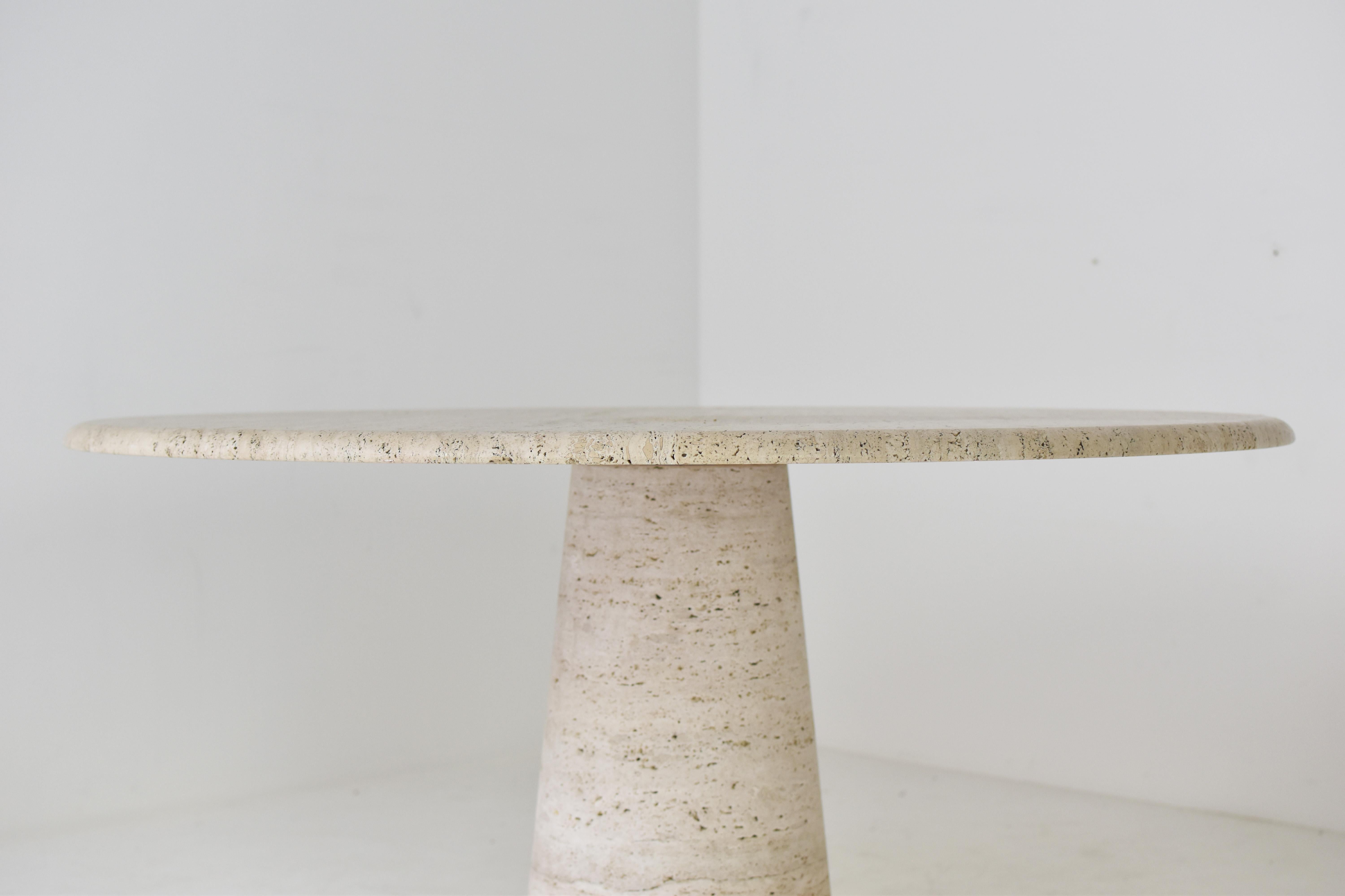 Round travertine dining table in the manner of Angelo Mangiarotti, Italy 1970’s 1