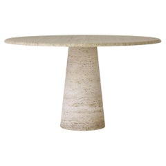 Round travertine dining table in the manner of Angelo Mangiarotti, Italy 1970’s