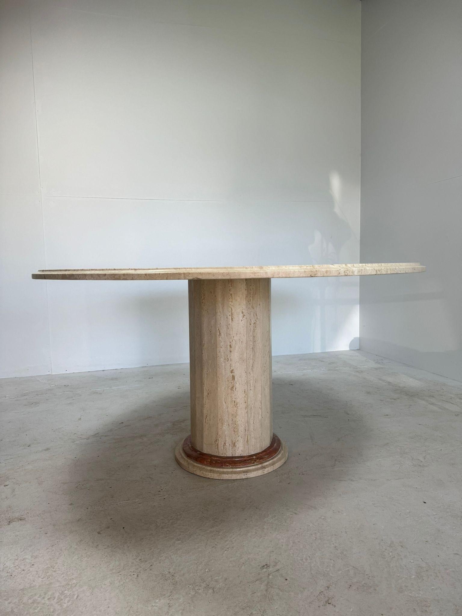 Round travertine diningtable with yellow marble and brass inlay 4
