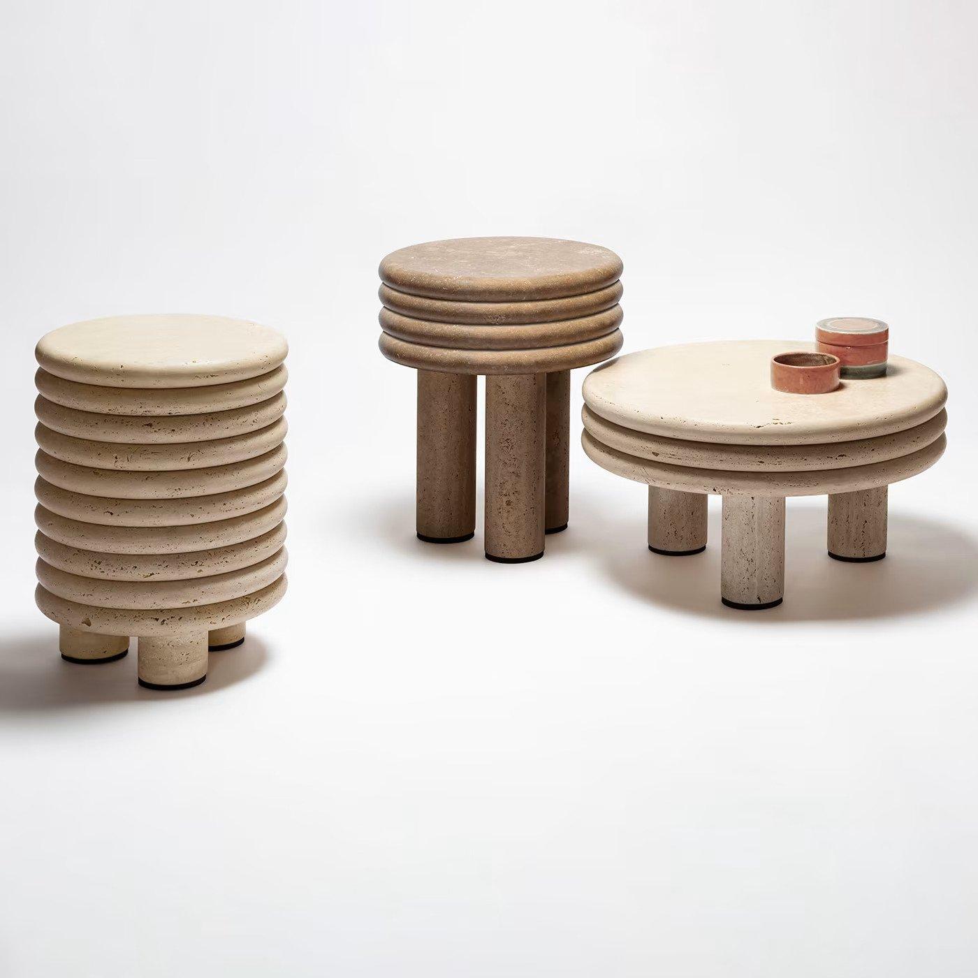 Contemporary round small high coffee table stool - Scala by Stephane Parmentier for Giobagnara.

Organic shapes take center stage in the Scala Collections designed by Stephane Parmentier for Giobagnara. Featured in travertine, this stool boasts