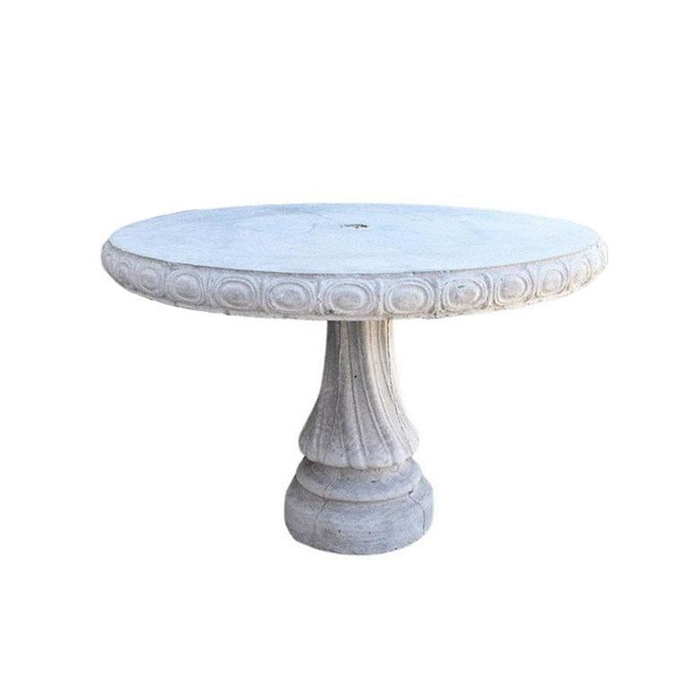 Create a charming outdoor oasis with this large round rustic French concrete garden or patio table. For the design lover looking to transition a natural elegance from the inside to the outside. Created from cast concrete, this Hollywood Regency