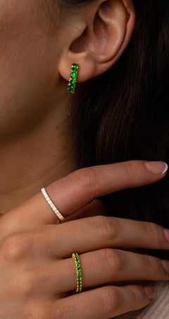 Round Tsavorite Eternity Ring in 18k Yellow Gold