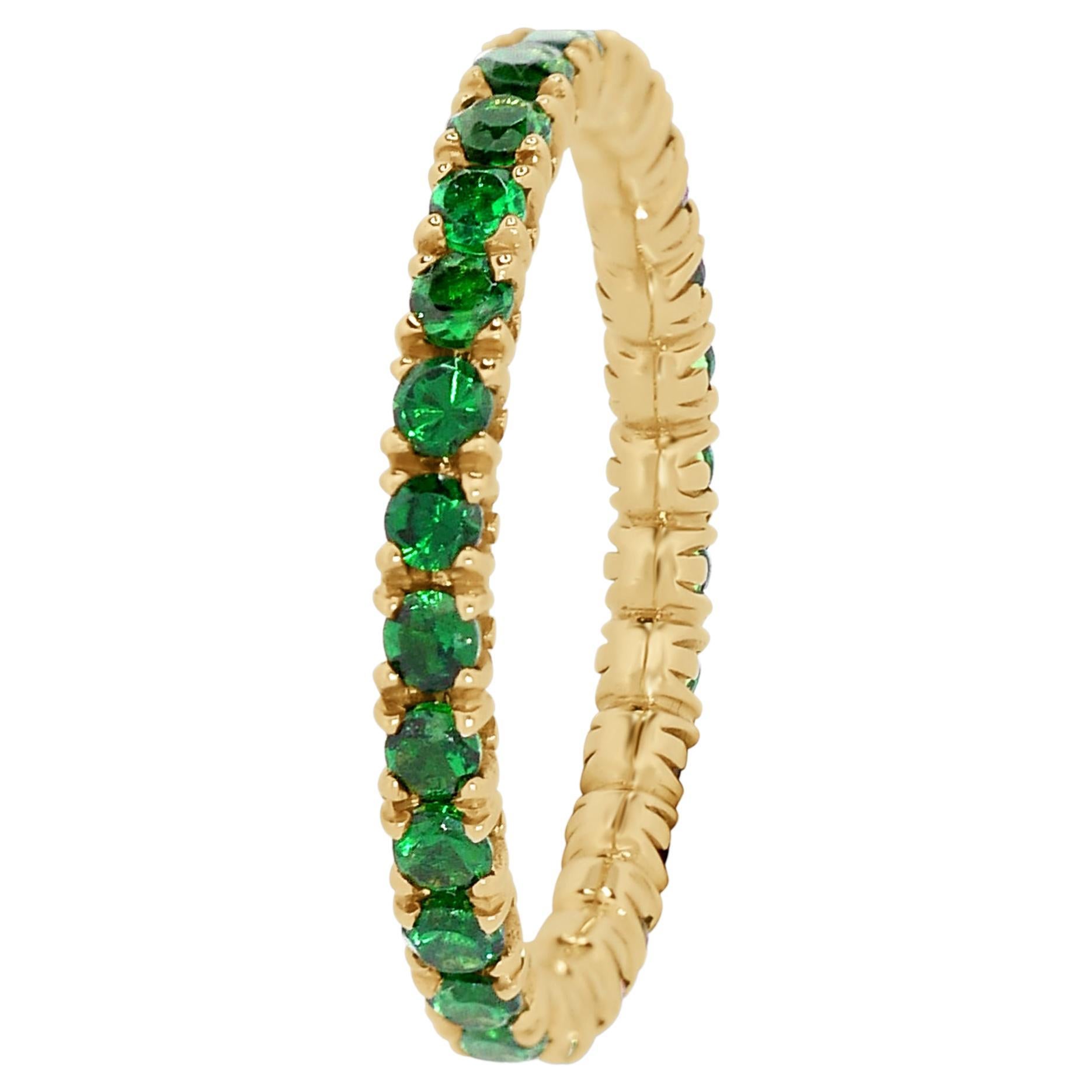 Round Tsavorite Eternity Ring in 18k Yellow Gold For Sale