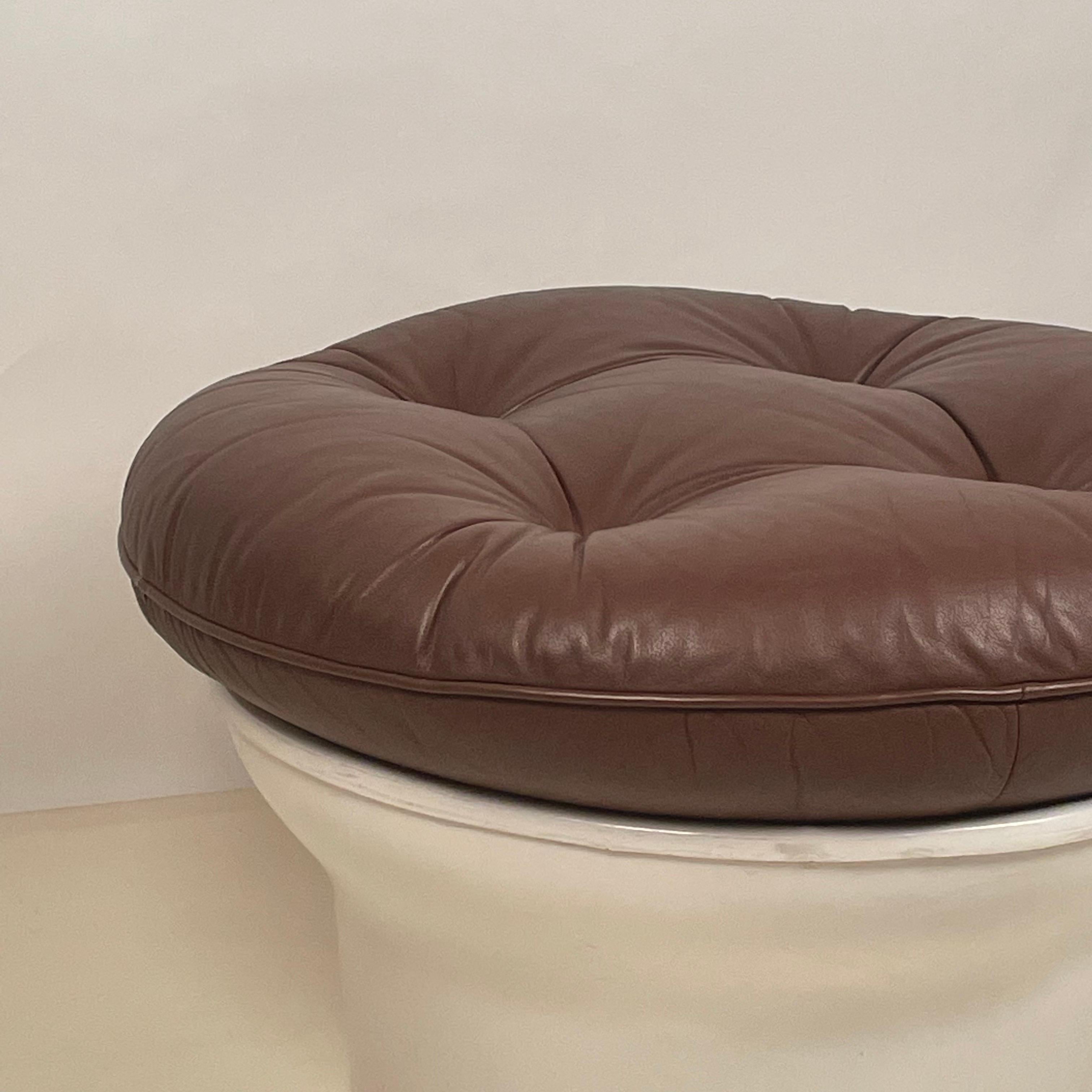 Rare 'Karate' fiberglass shell ottoman by Michel Cadestin. This iconic ottoman was designed circa 1970 by Michel Cadestin for French furniture manufacturer Airborne. We also have the pair of matching swiveling armchairs listed: please search for