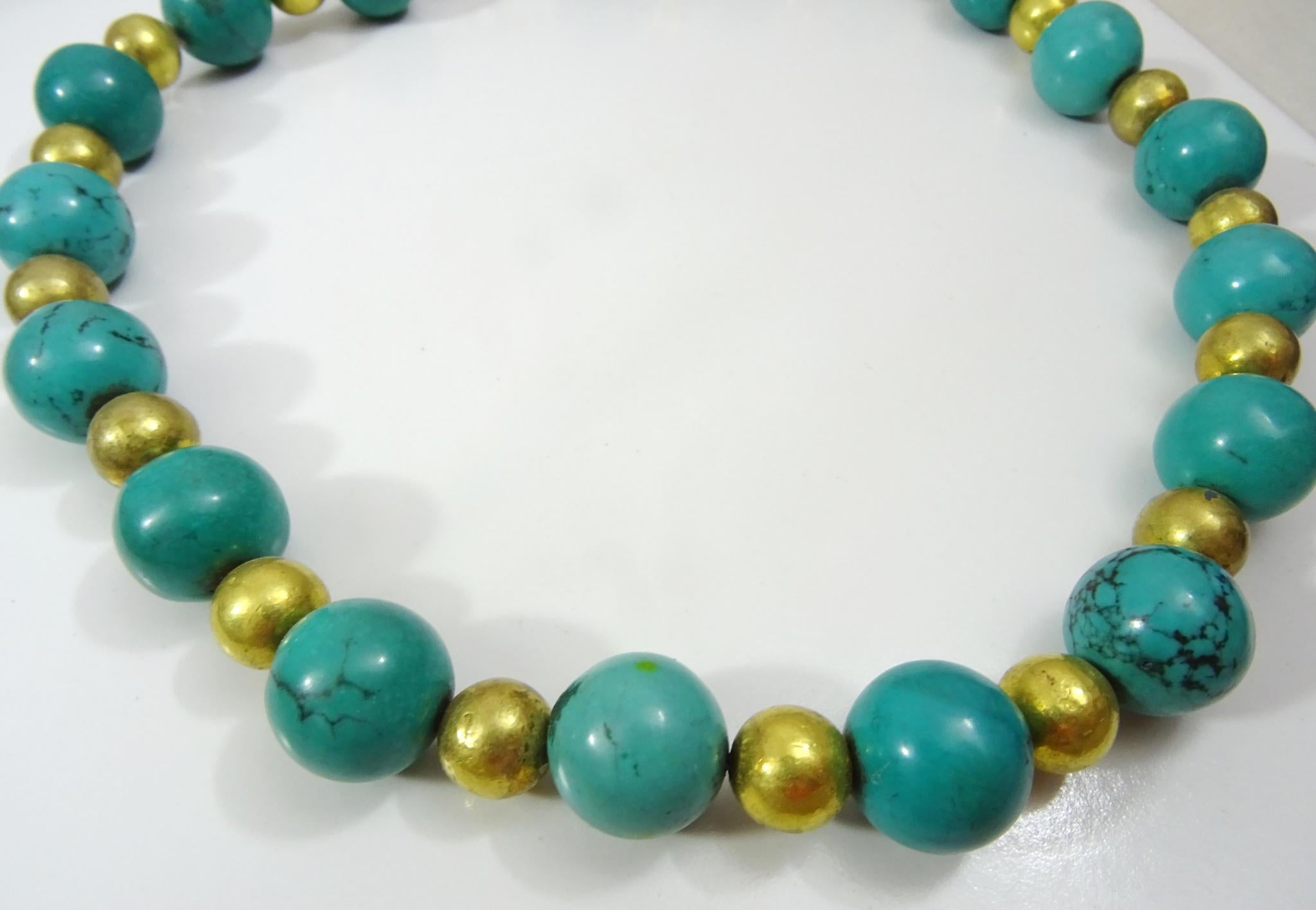 
This very striking and elegant necklace was put together in our Jerusalem workshop ,
 14 mm round Chinese Turquoise of superior quality enhanced by 9 mm round 18 karat Gold wax beads create this unique and extremely wearable composition, 
The
