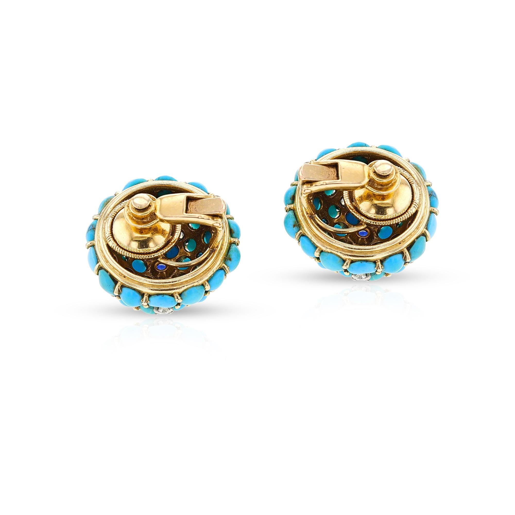 A stunning pair of Round Earrings set with Turquoise Cabochons, a center Sapphire and four Diamonds on each. Set in 18K Yellow Gold. Total Weight: 22.60 grams. 



SKU 1250-BDJAMPL