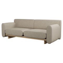 Round two-seater sofa Tilda with Beige plain weave handcrafted by Murmurio