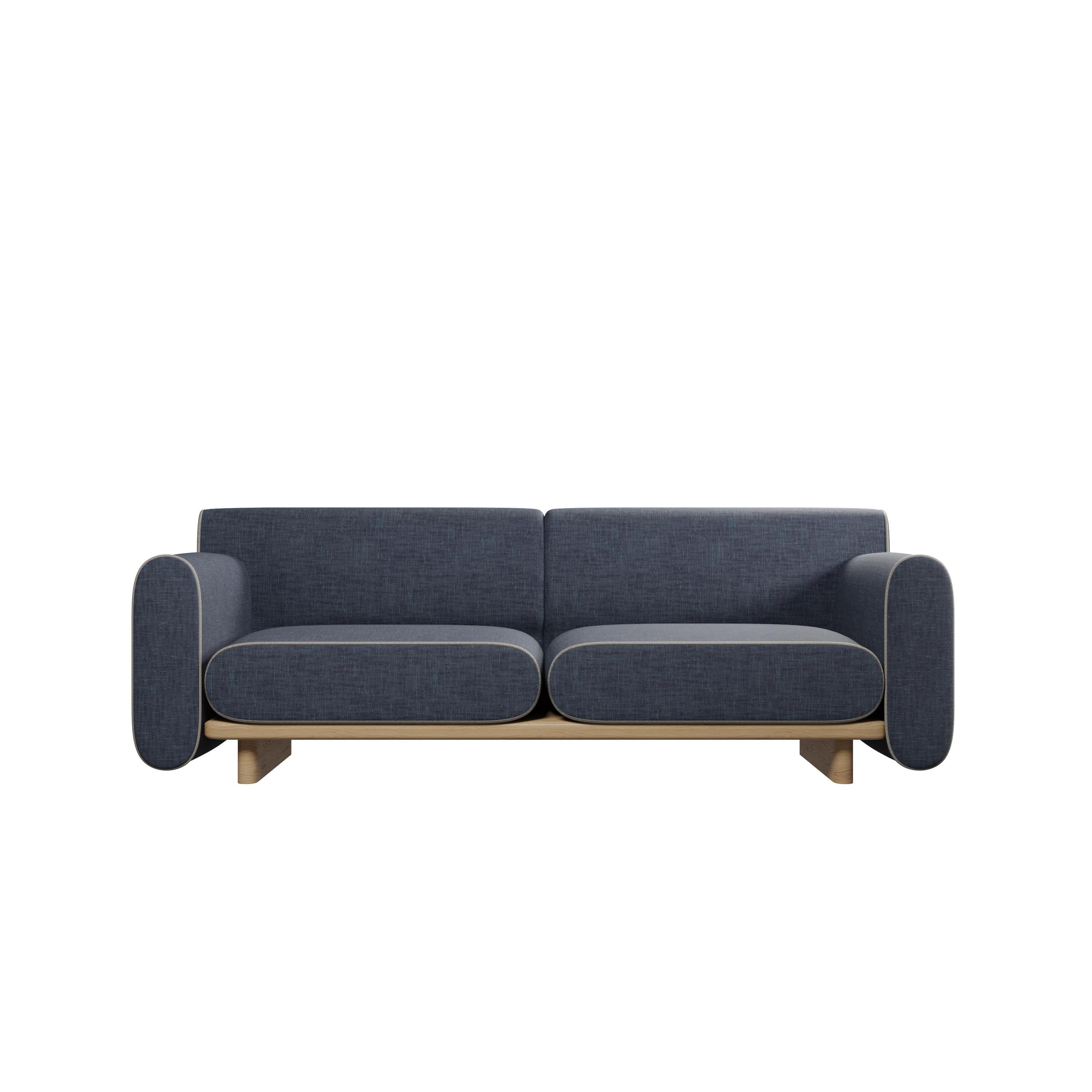 The TILDA two-seater sofa exemplifies minimalist elegance with its smooth lines, elegant curves and refined wooden plinth. Its distinctive shape not only creates a sense of fluidity and grace, but also greatly enhances its inviting appearance,
