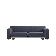 Round two-seater sofa Tilda with Denim plain fabric handcrafted by Murmurio