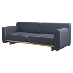 Round two-seater sofa Tilda with Denim plain fabric handcrafted by Murmurio