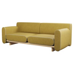 Round two-seater sofa Tilda with Honey plain fabric handcrafted by Murmurio