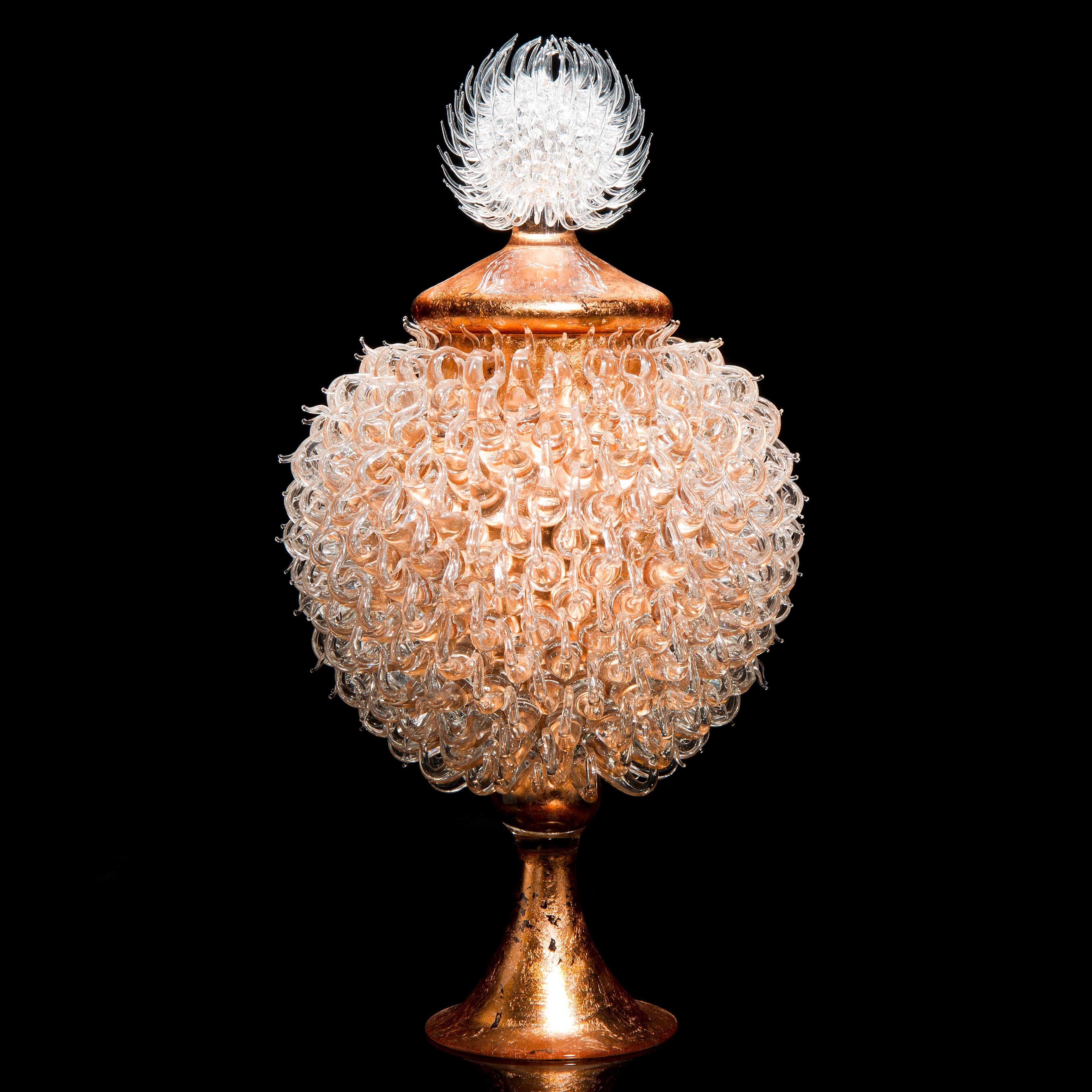 Round Venus jar with thistle top is a unique glass and copper artwork by the British glass artist James Lethbridge. Blown glass with copper leaf gilding on the inside. The outer layer is covered in handcrafted flame worked decoration and